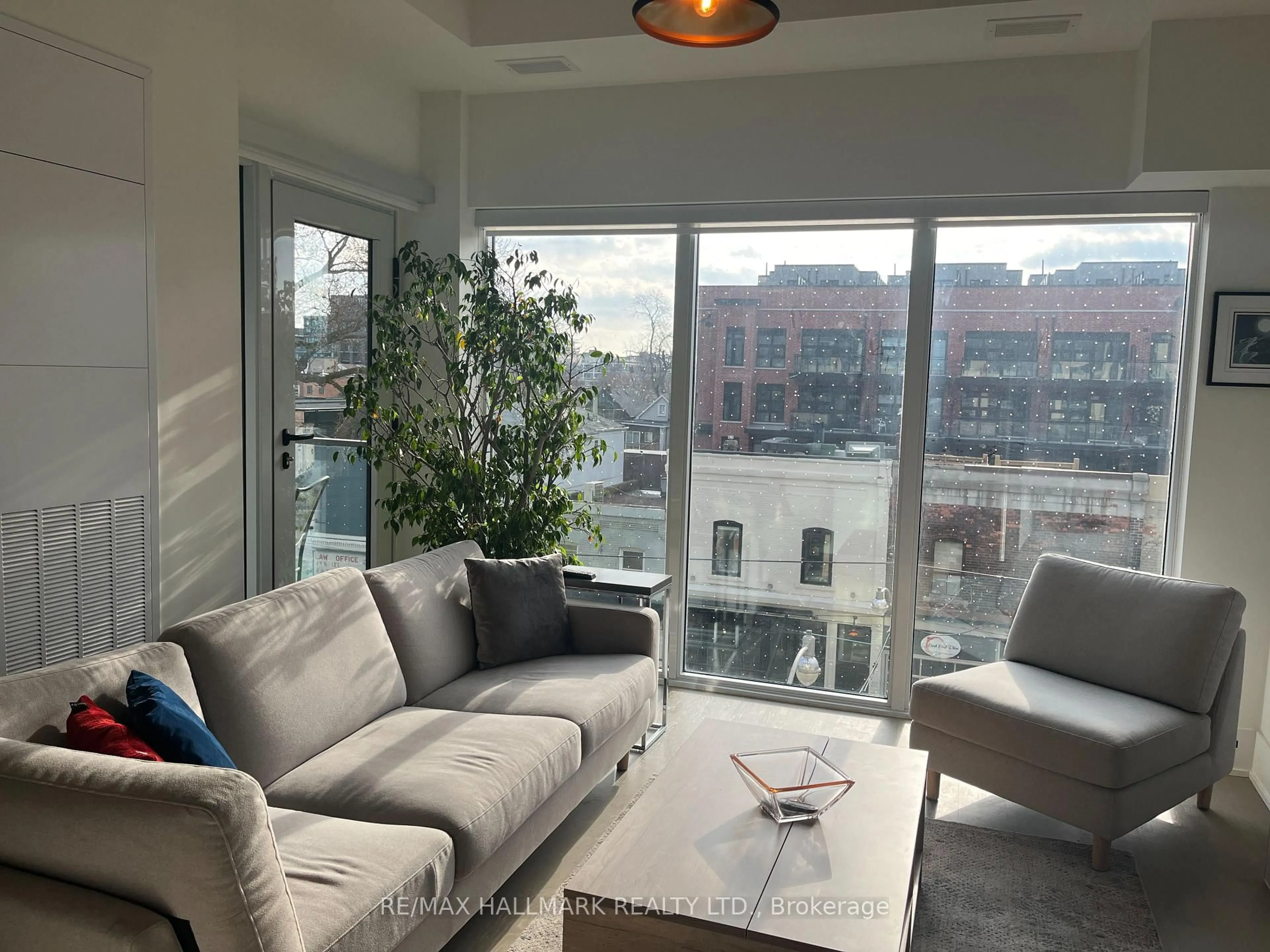 Living room with furniture, unknown for 495 Logan Ave #313, Toronto Ontario M4K 0A5