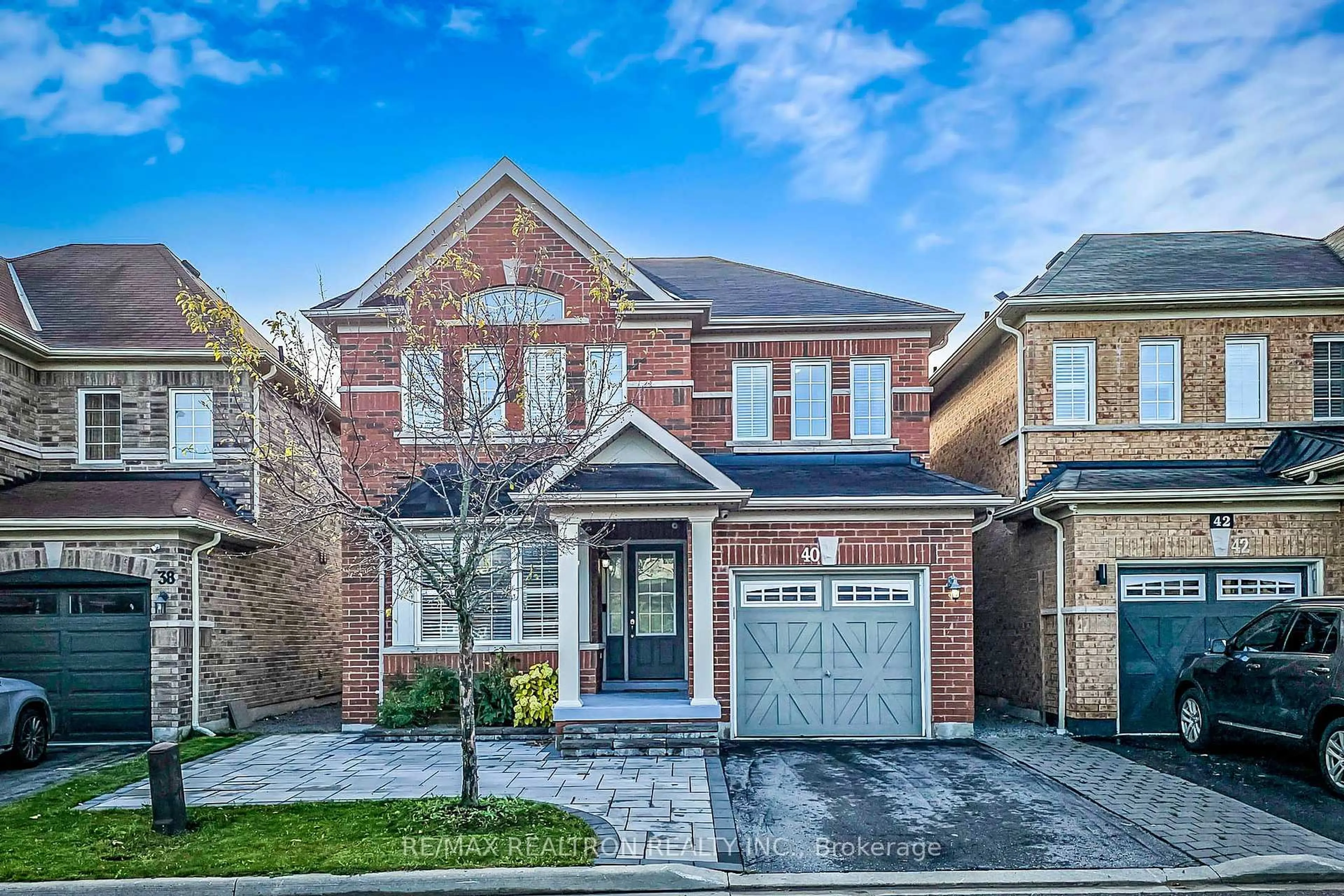 Home with brick exterior material, street for 40 Oswell Dr, Ajax Ontario L1Z 0L4