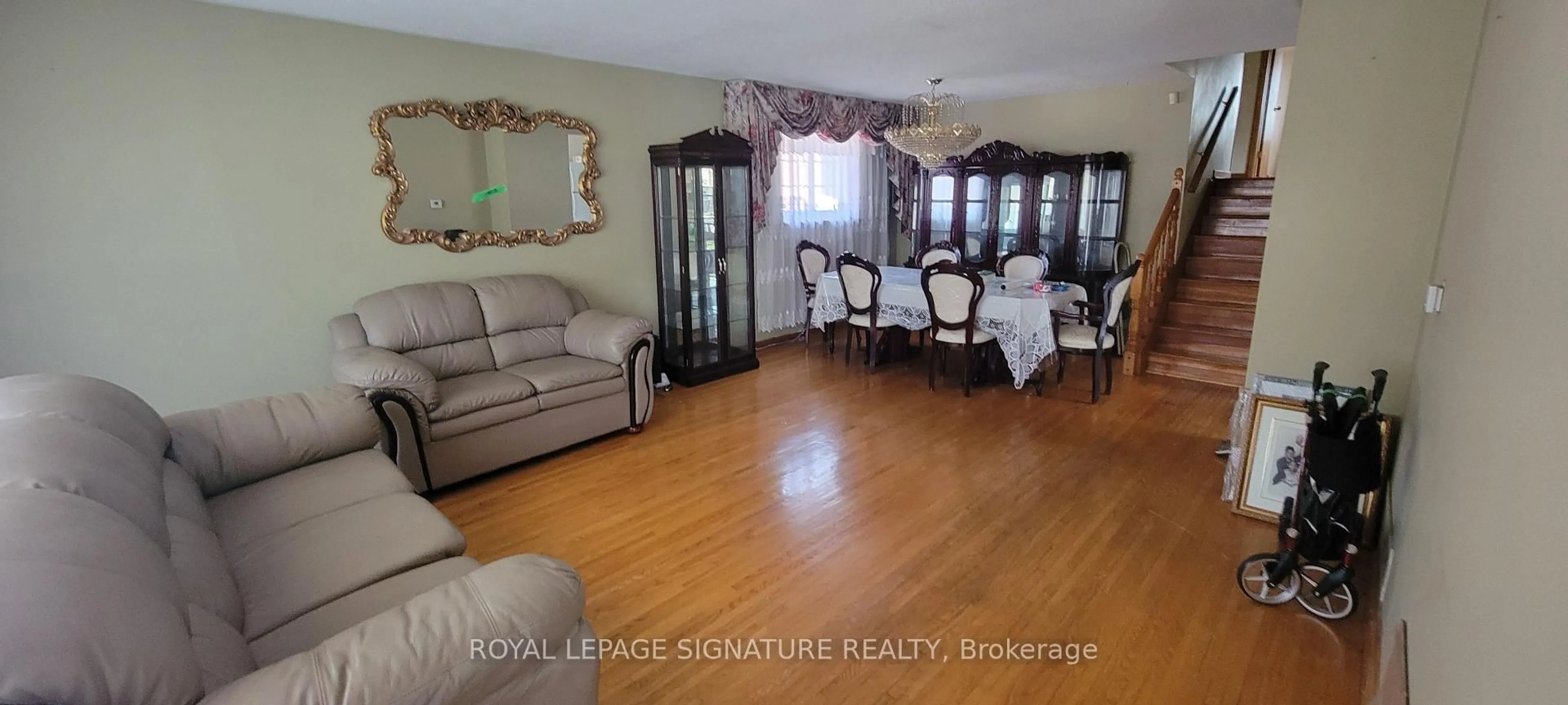 Living room with furniture, wood/laminate floor for 235 Danzig St, Toronto Ontario M1E 2L5