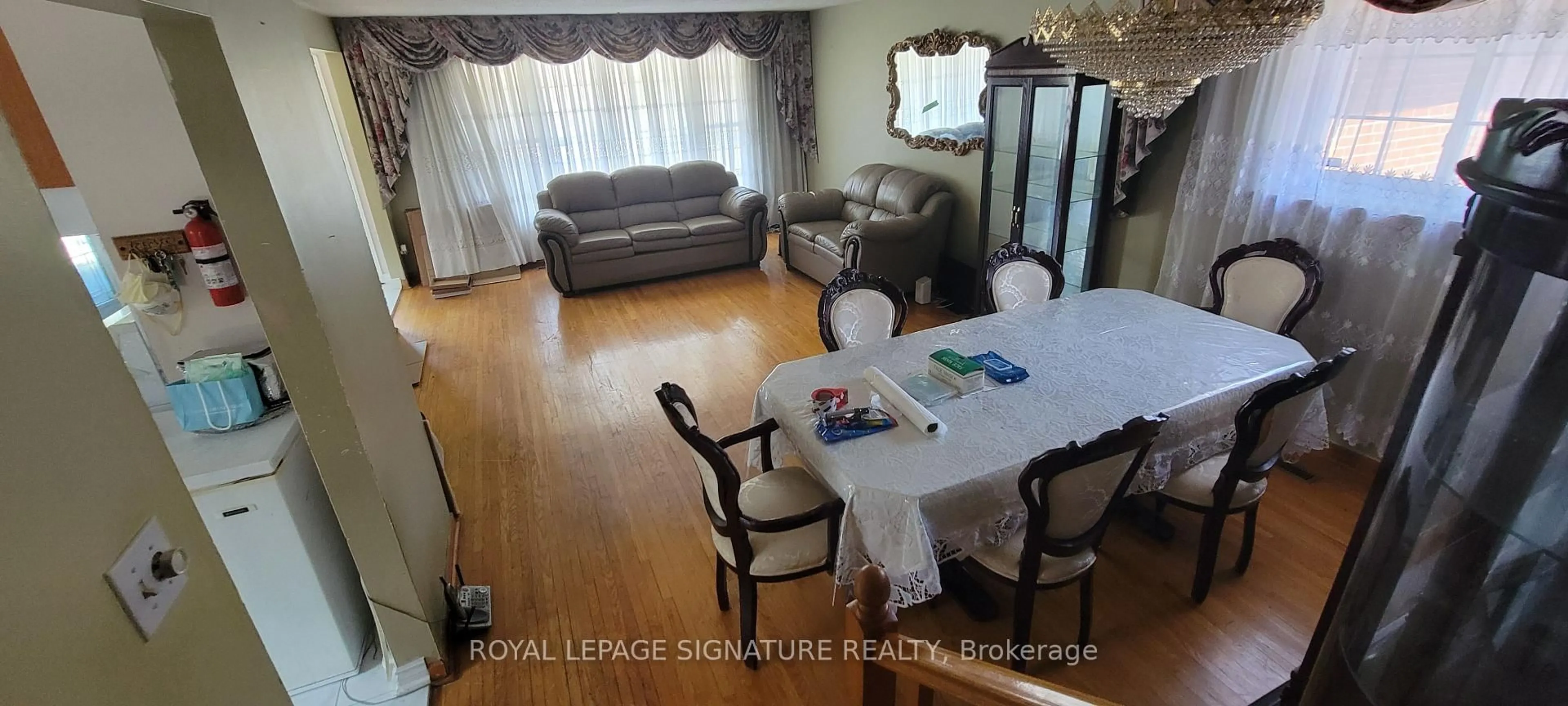 Dining room, wood/laminate floor for 235 Danzig St, Toronto Ontario M1E 2L5