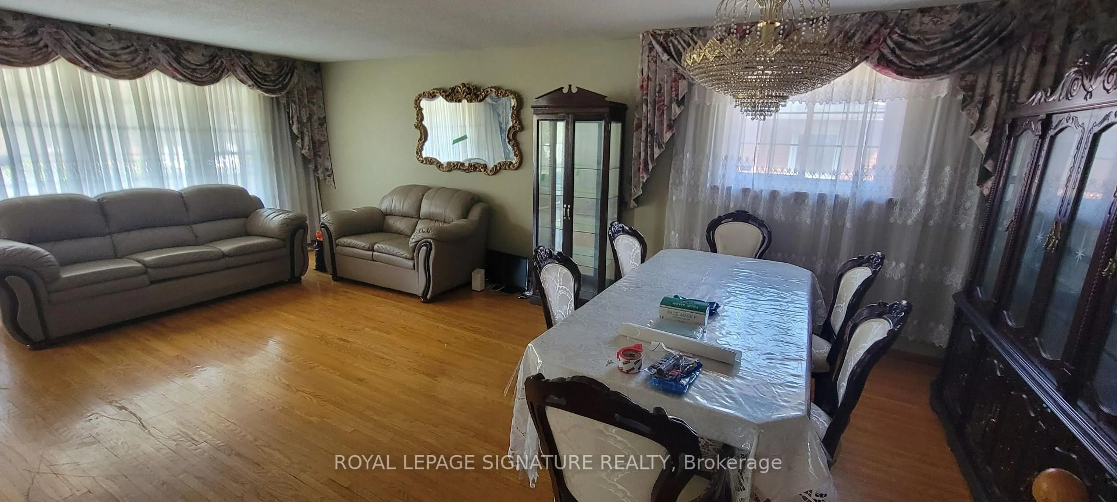 Dining room, wood/laminate floor for 235 Danzig St, Toronto Ontario M1E 2L5
