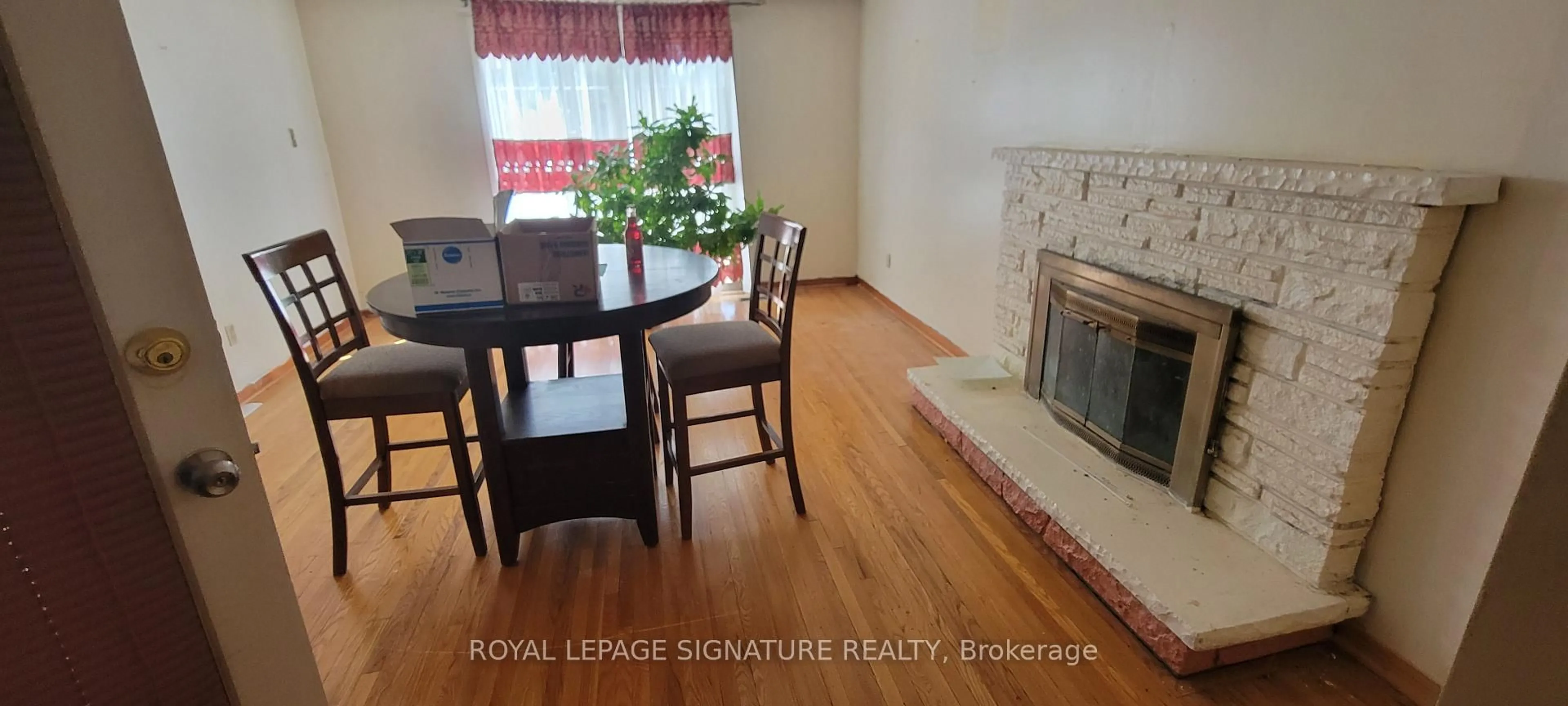 Living room with furniture, wood/laminate floor for 235 Danzig St, Toronto Ontario M1E 2L5