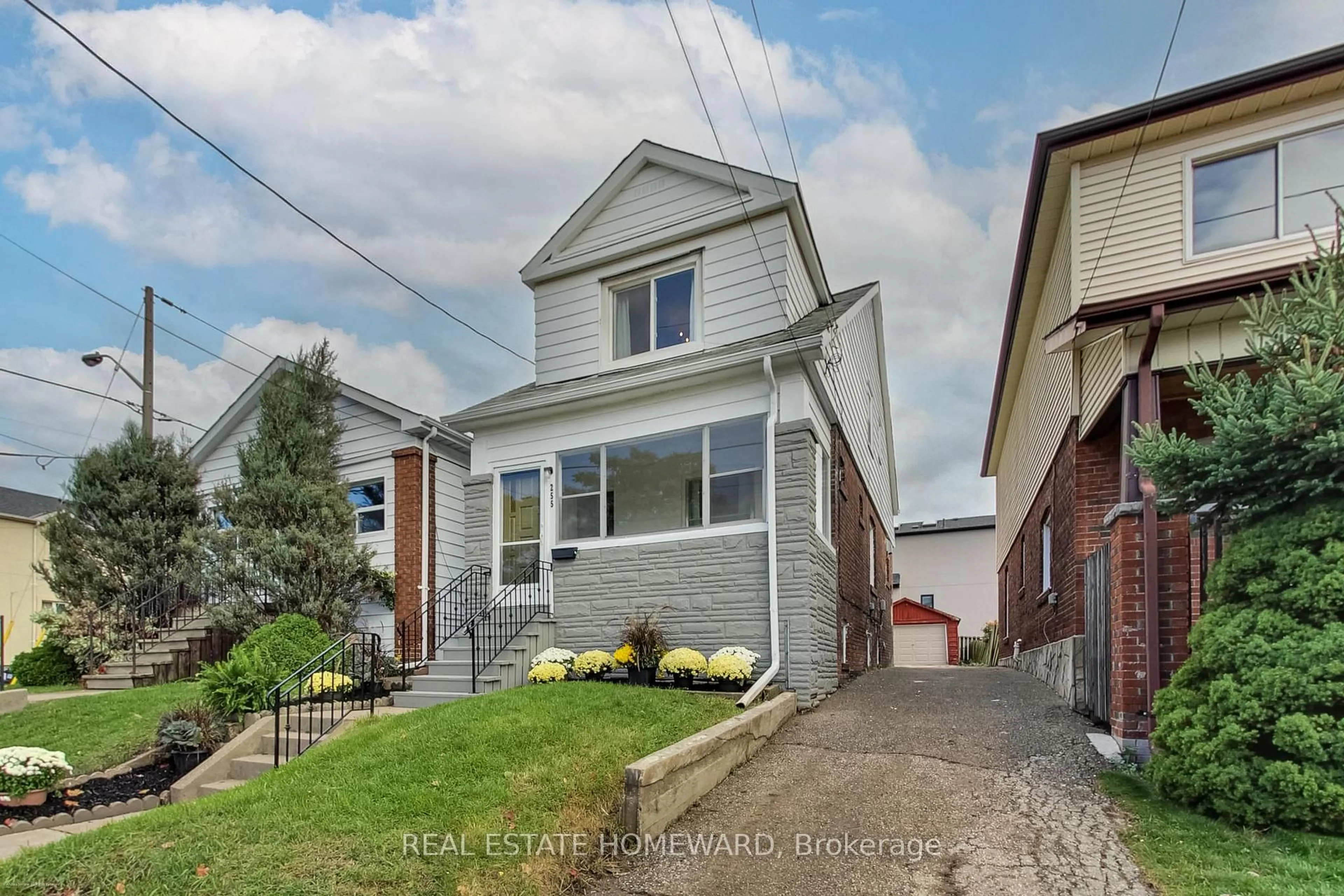 Home with brick exterior material, street for 255 Westlake Ave, Toronto Ontario M4C 4T3
