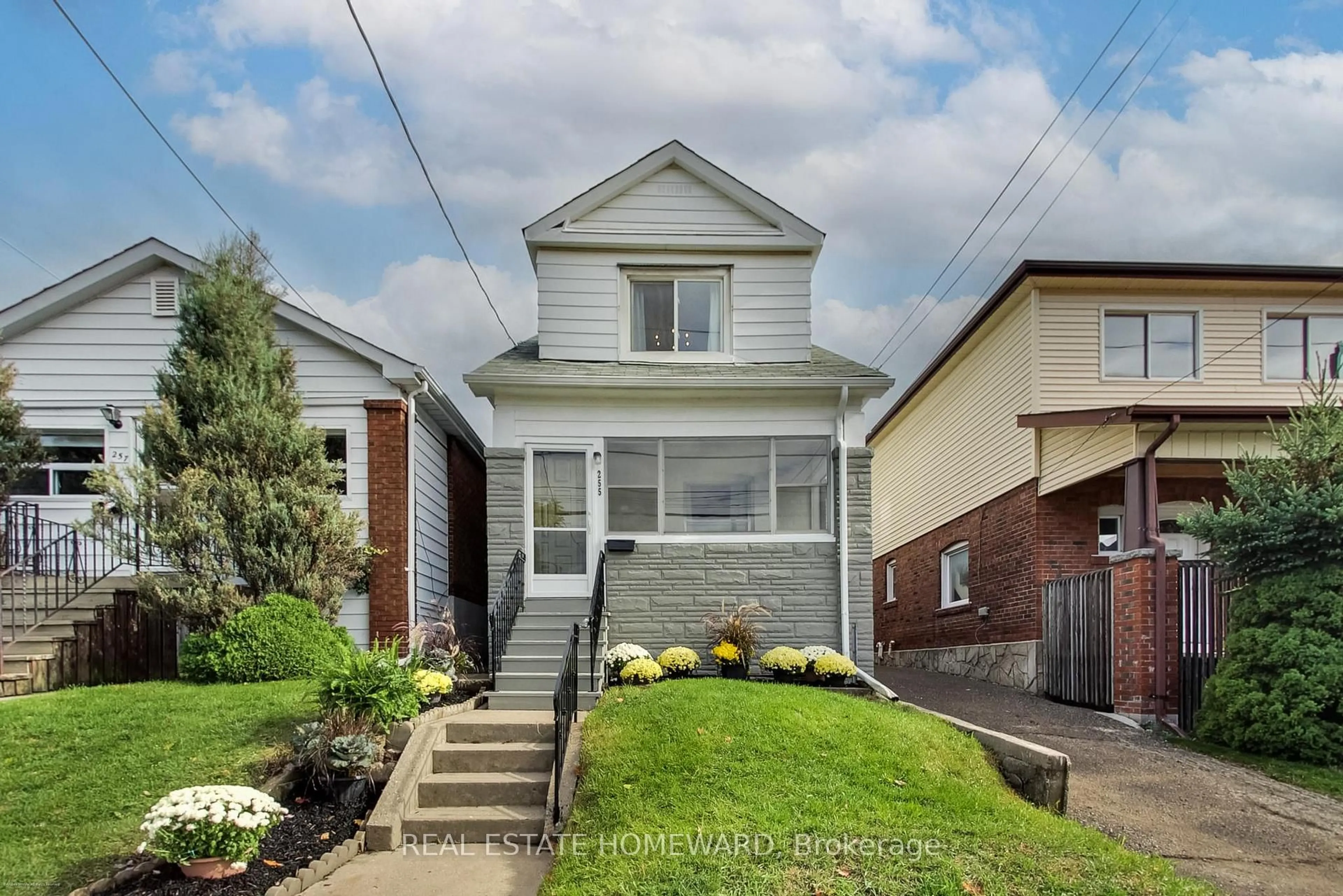 Home with brick exterior material, street for 255 Westlake Ave, Toronto Ontario M4C 4T3