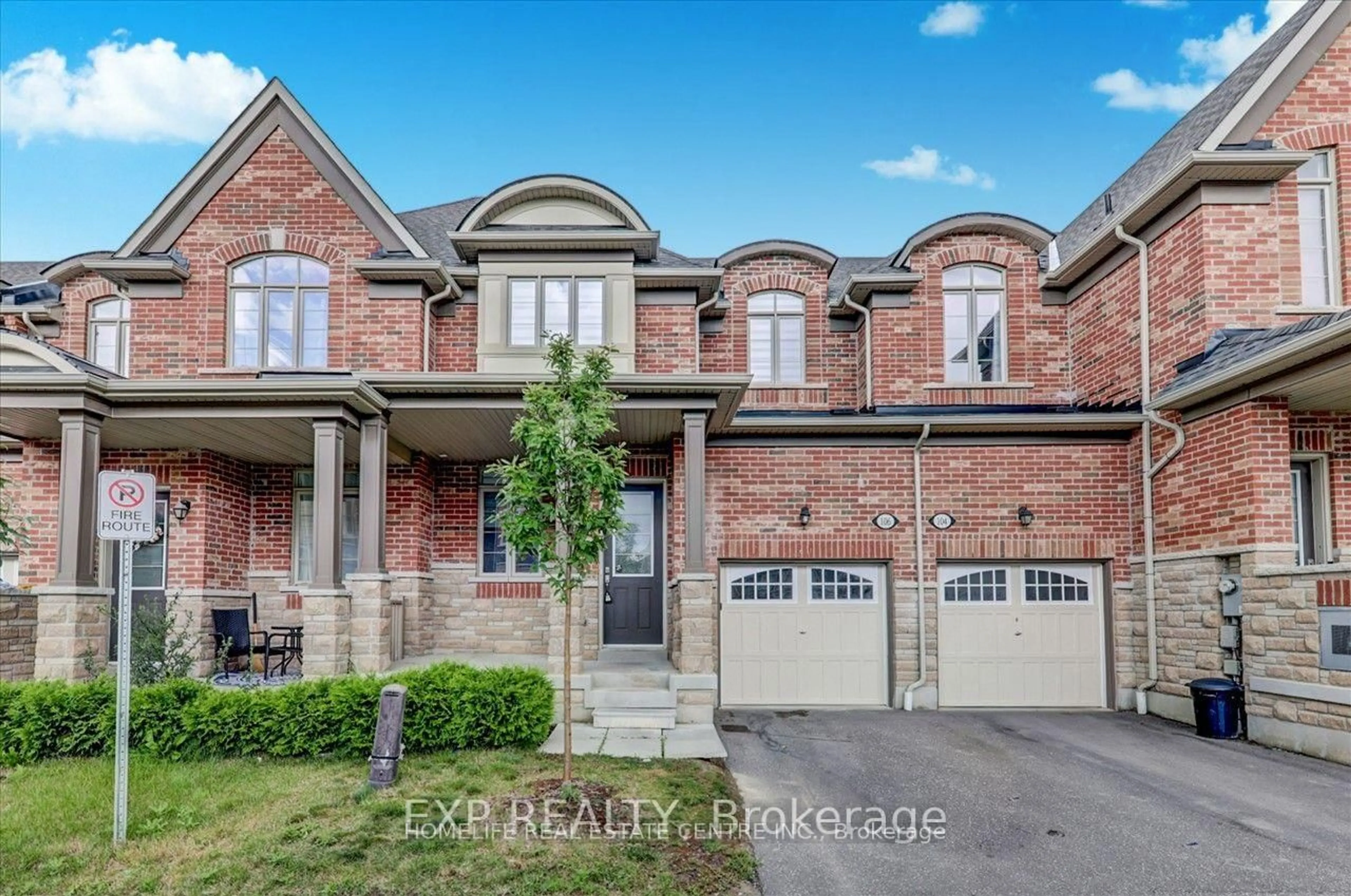 Home with brick exterior material, street for 106 Masterson Lane, Ajax Ontario L1T 0N6