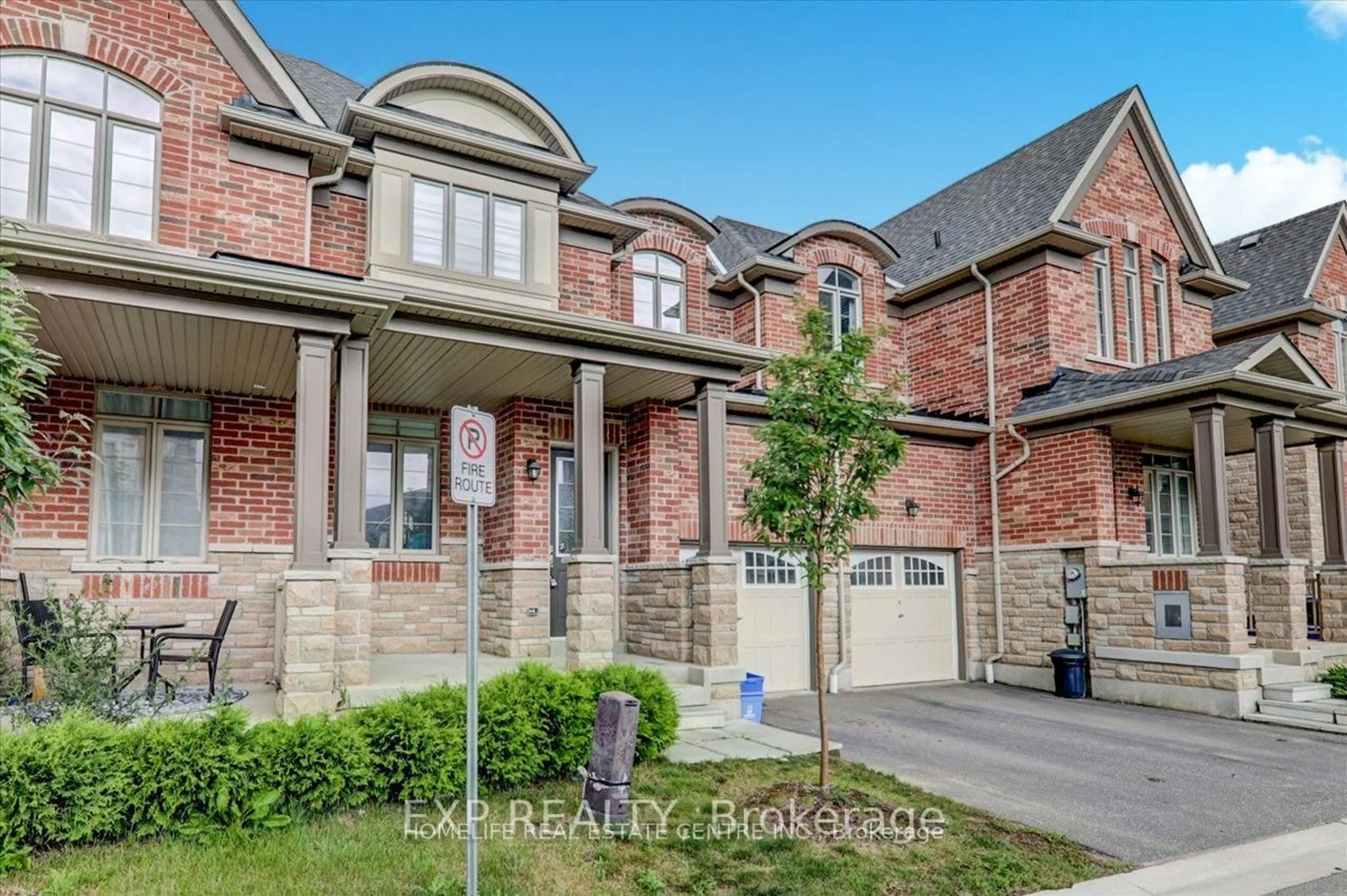 Home with brick exterior material, street for 106 Masterson Lane, Ajax Ontario L1T 0N6