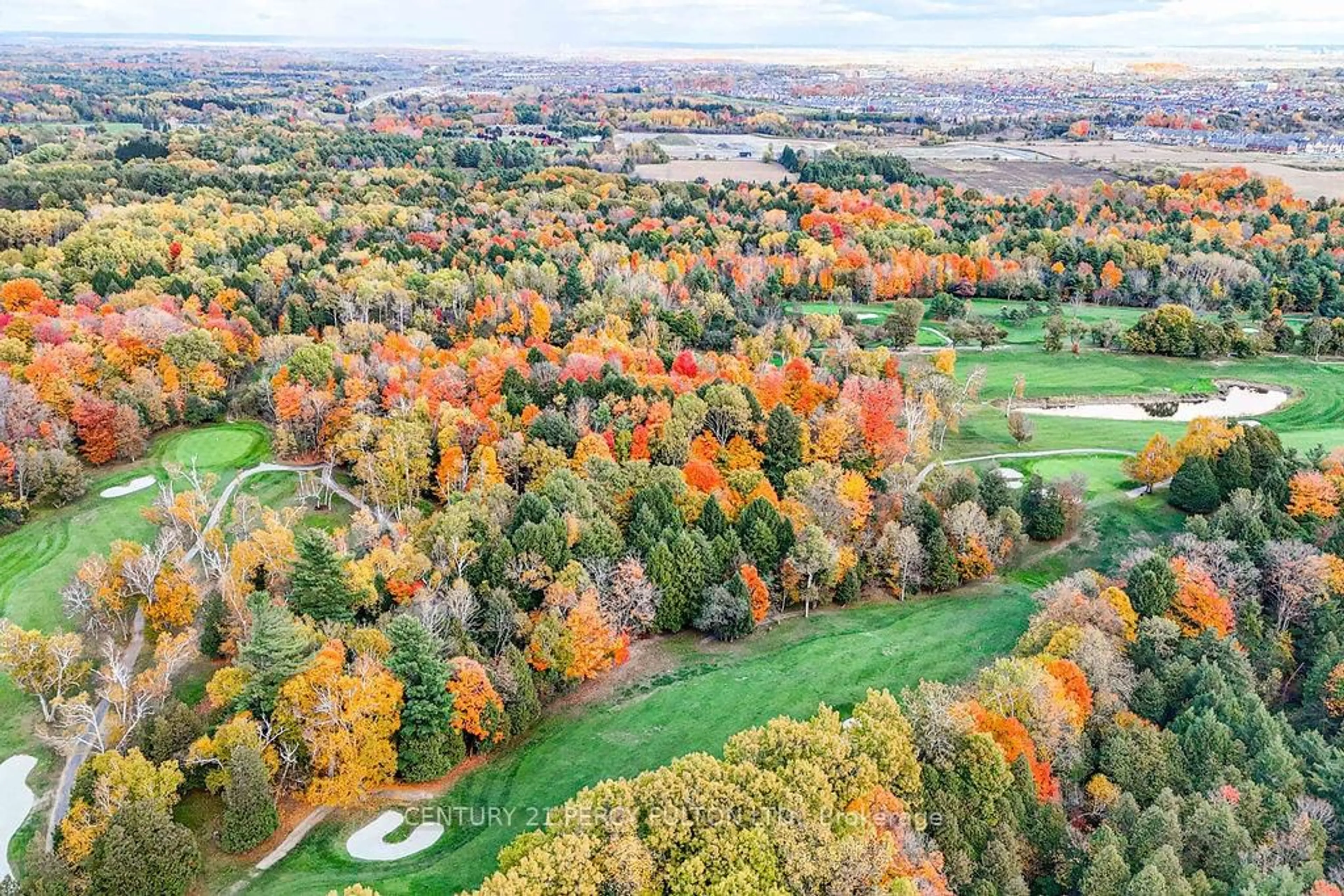 A pic from outside/outdoor area/front of a property/back of a property/a pic from drone, forest/trees view for 2635 William Jackson Dr #702, Pickering Ontario L1X 0L4
