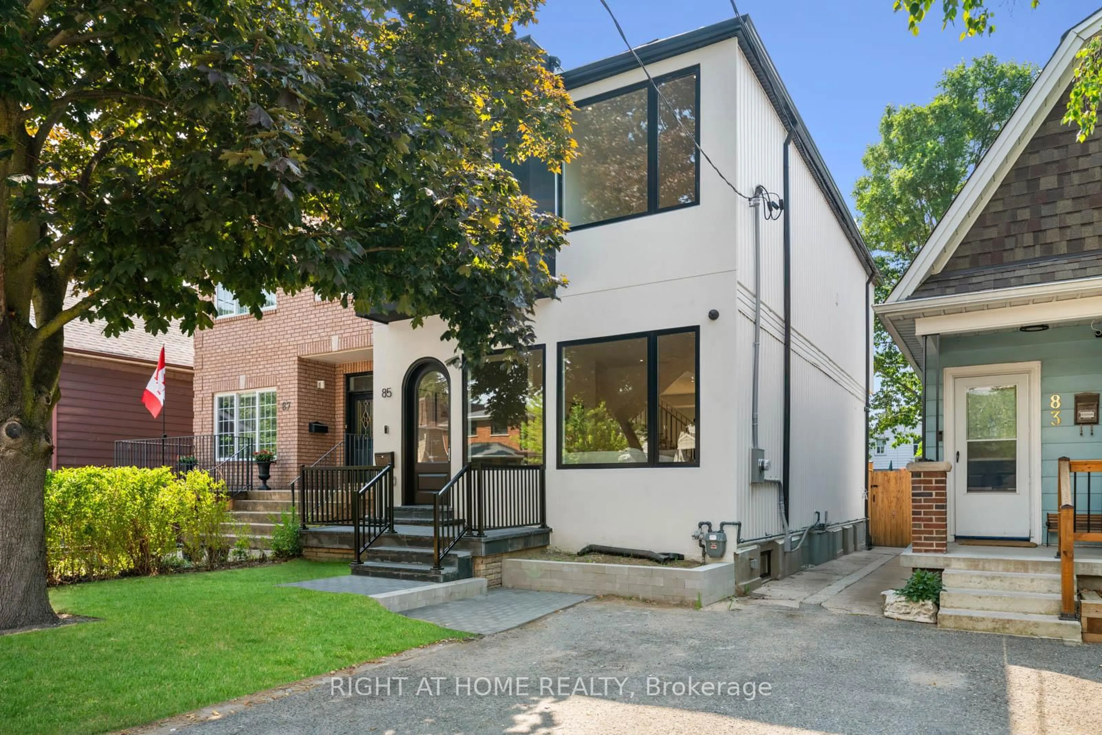Home with brick exterior material, street for 85 Holborne Ave, Toronto Ontario M4C 2R3