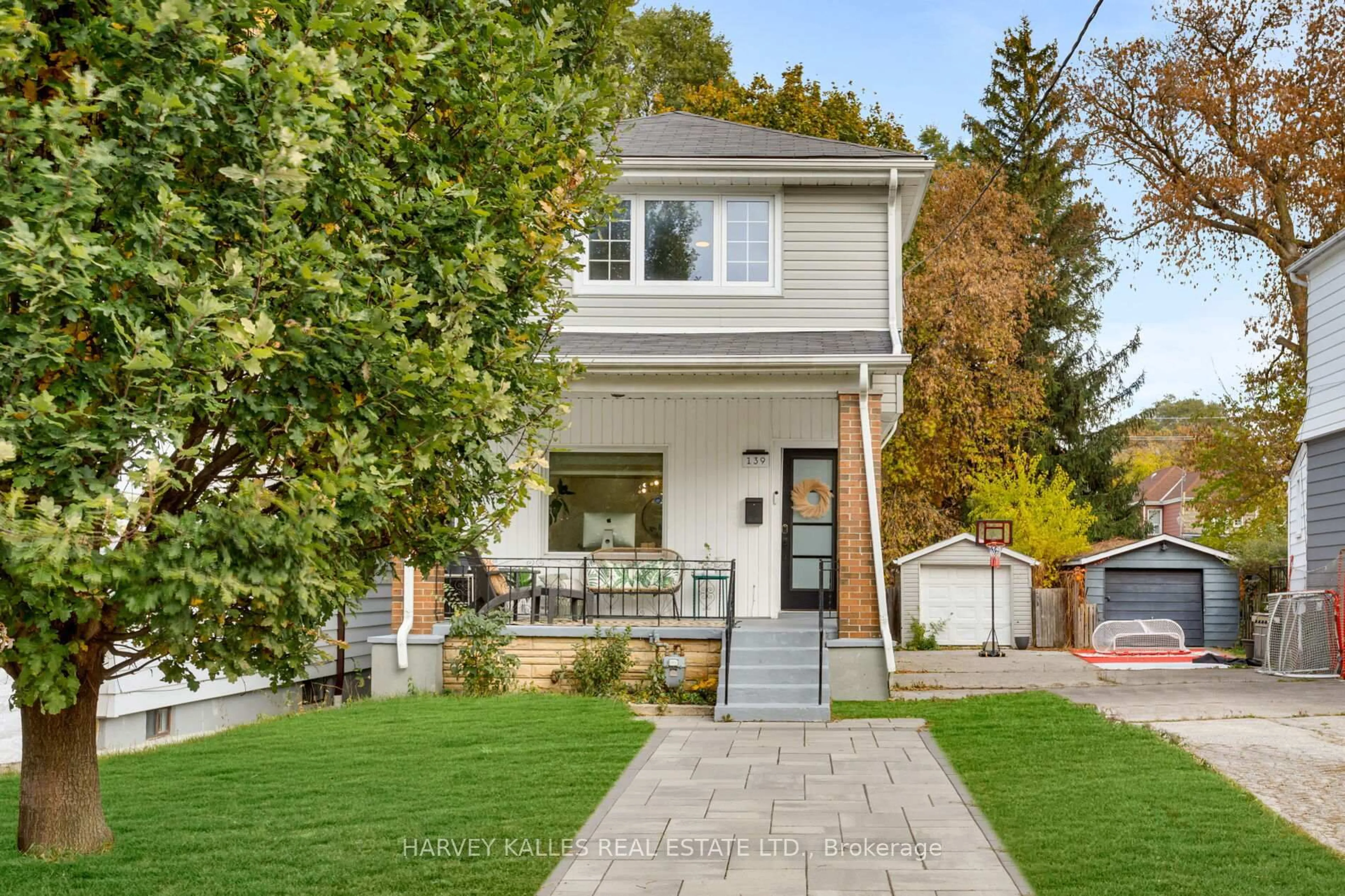 Home with brick exterior material, street for 139 King Edward Ave, Toronto Ontario M4C 5J7