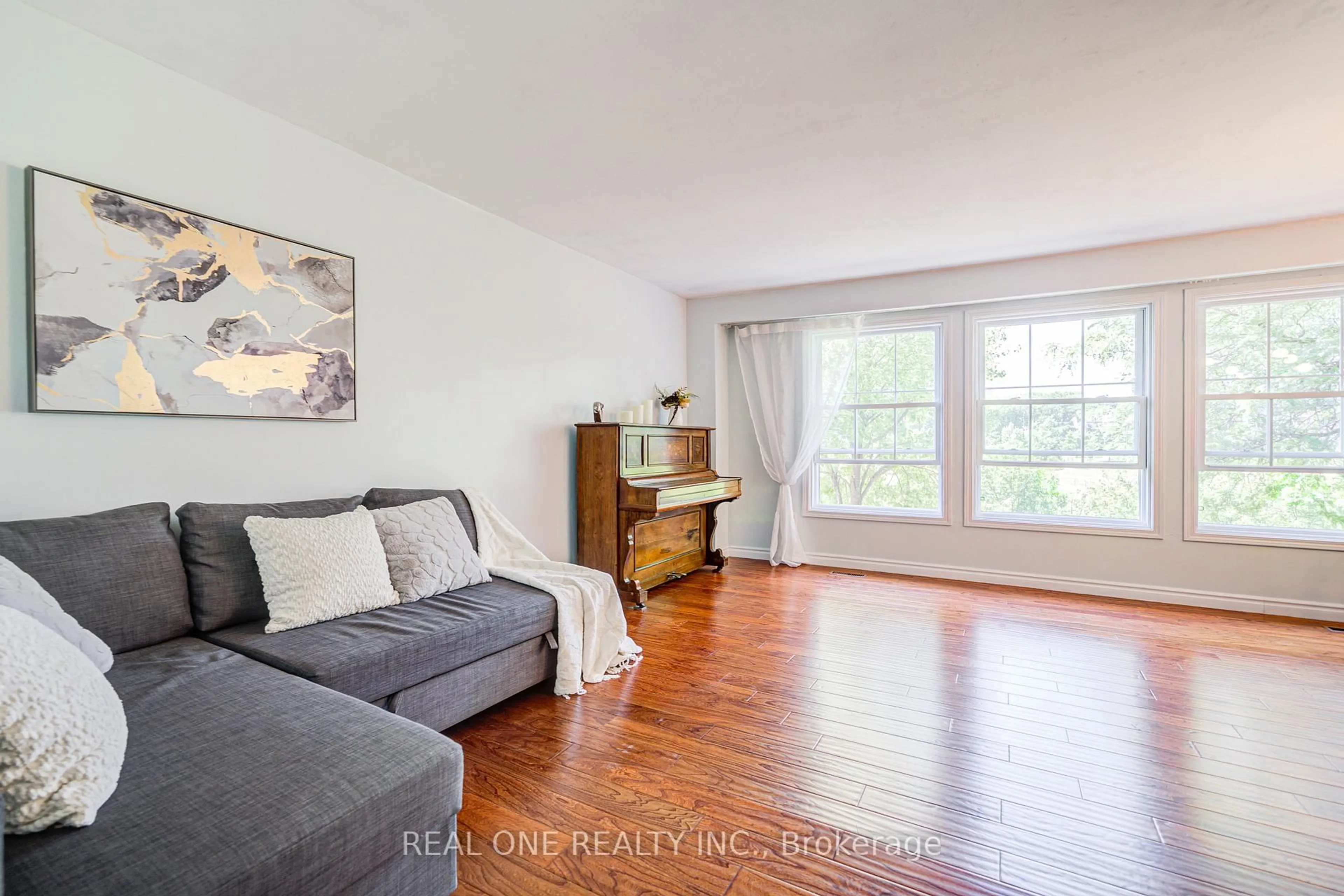 Living room with furniture, wood/laminate floor for 81 Brookmill Blvd #46, Toronto Ontario M1W 2L5