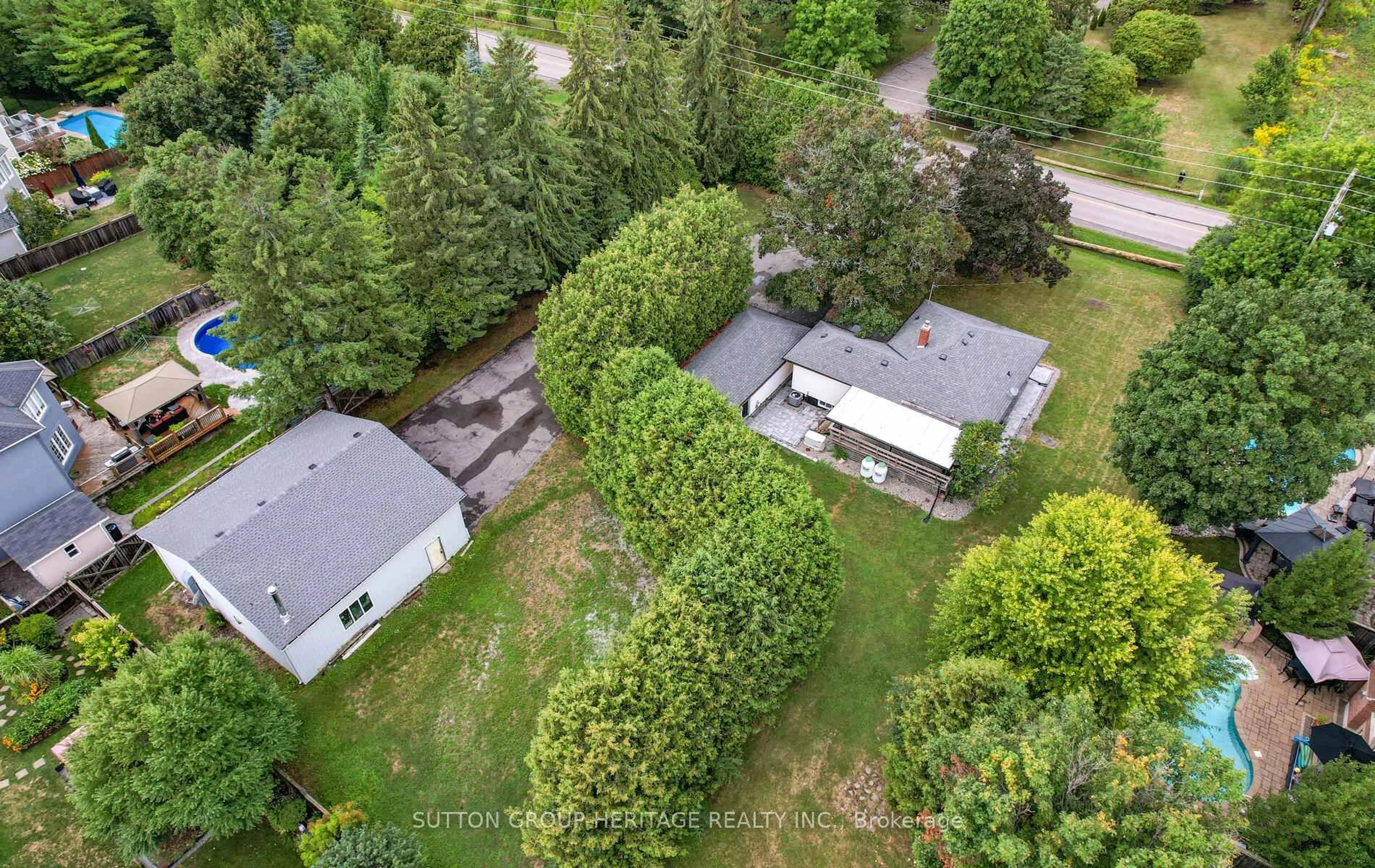 A pic from outside/outdoor area/front of a property/back of a property/a pic from drone, forest/trees view for 405 Columbus Rd, Whitby Ontario L1M 1L3