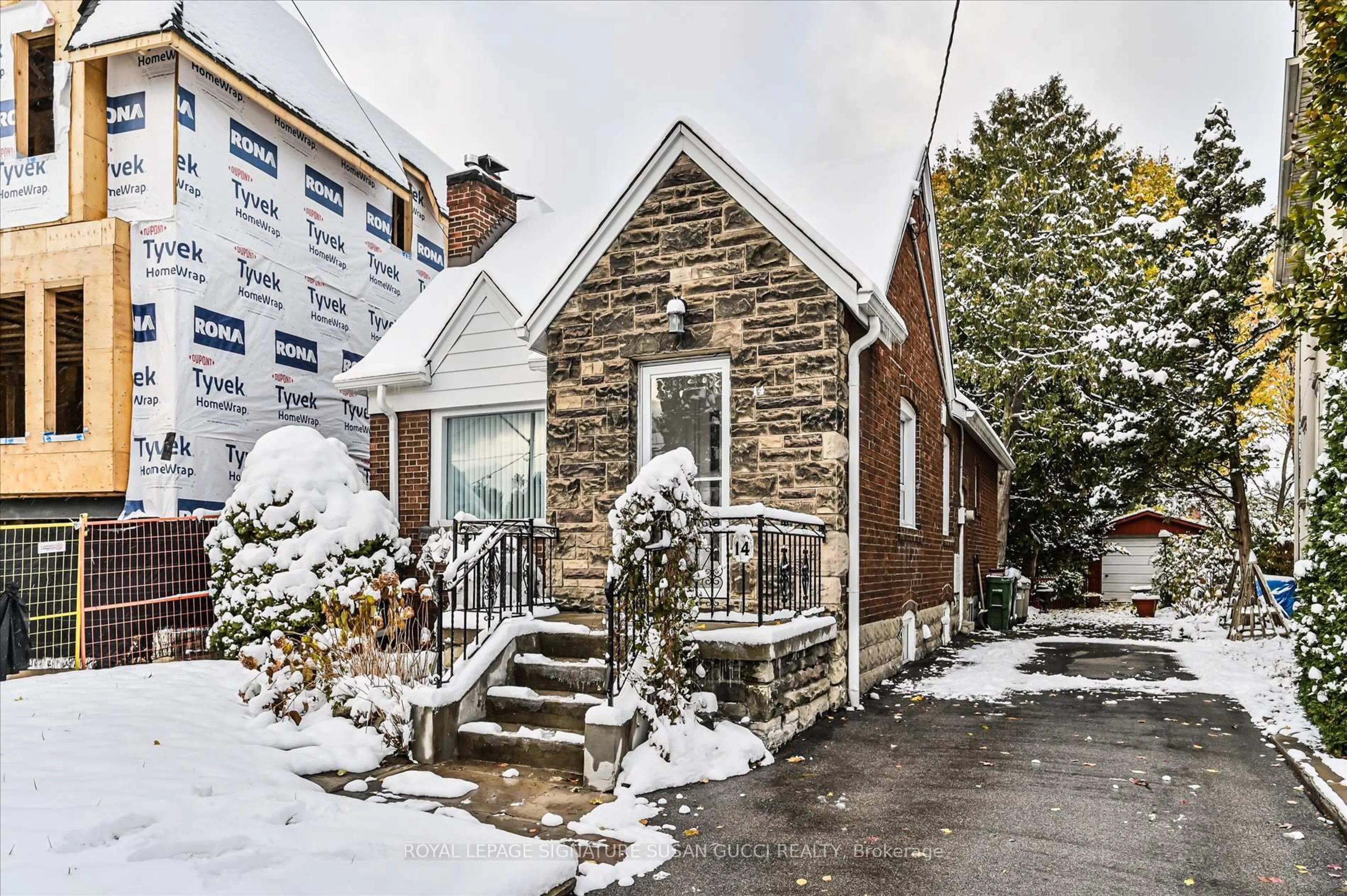 Home with brick exterior material, street for 14 Dustan Cres, Toronto Ontario M4J 4G5