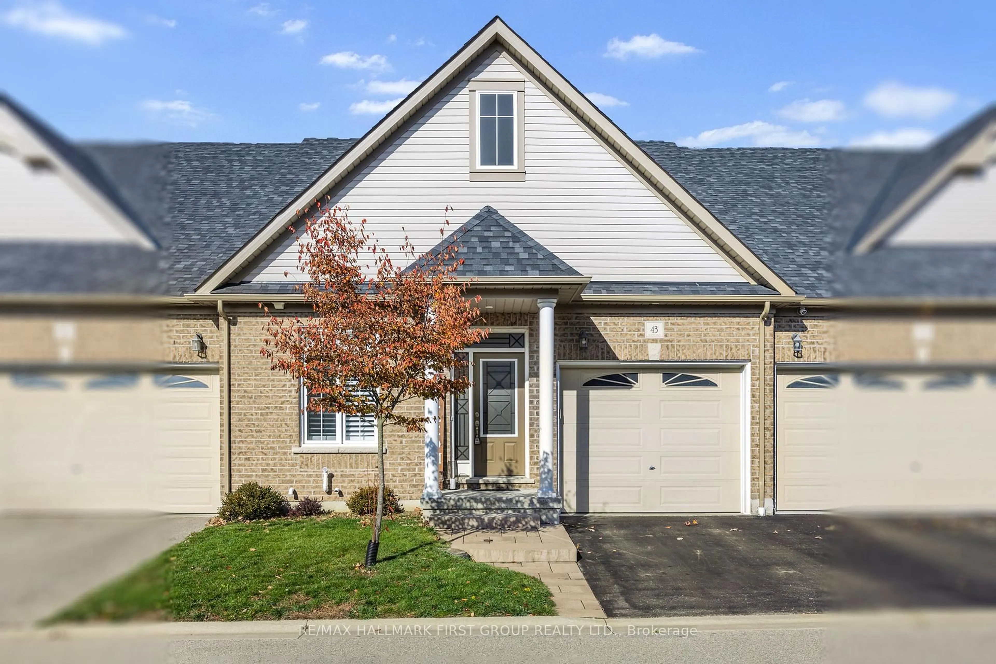 Home with vinyl exterior material, street for 43 Washburn Path, Clarington Ontario L1E 0J7