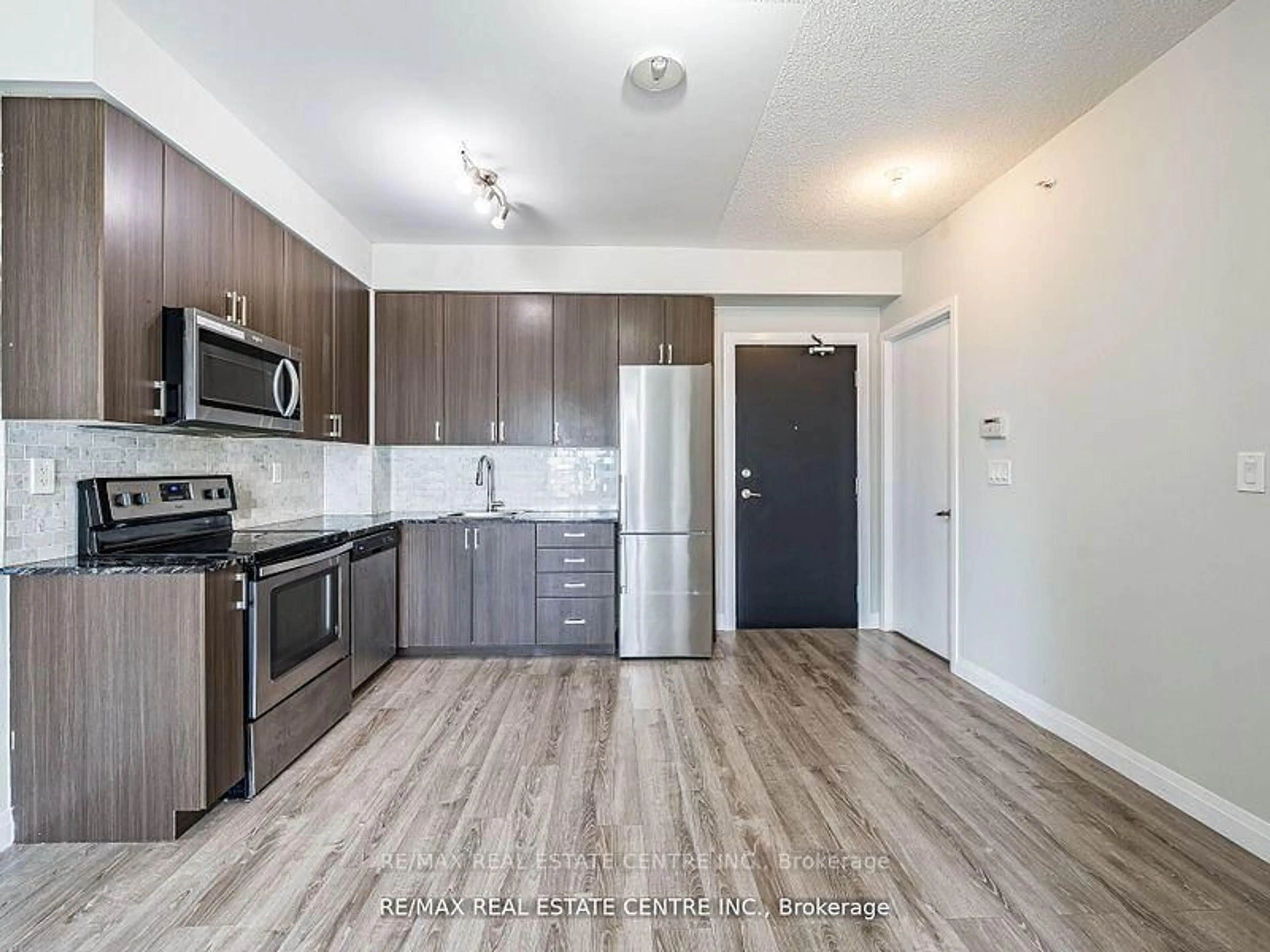 Standard kitchen, wood/laminate floor for 22 East Haven Dr #306, Toronto Ontario M1N 0B4