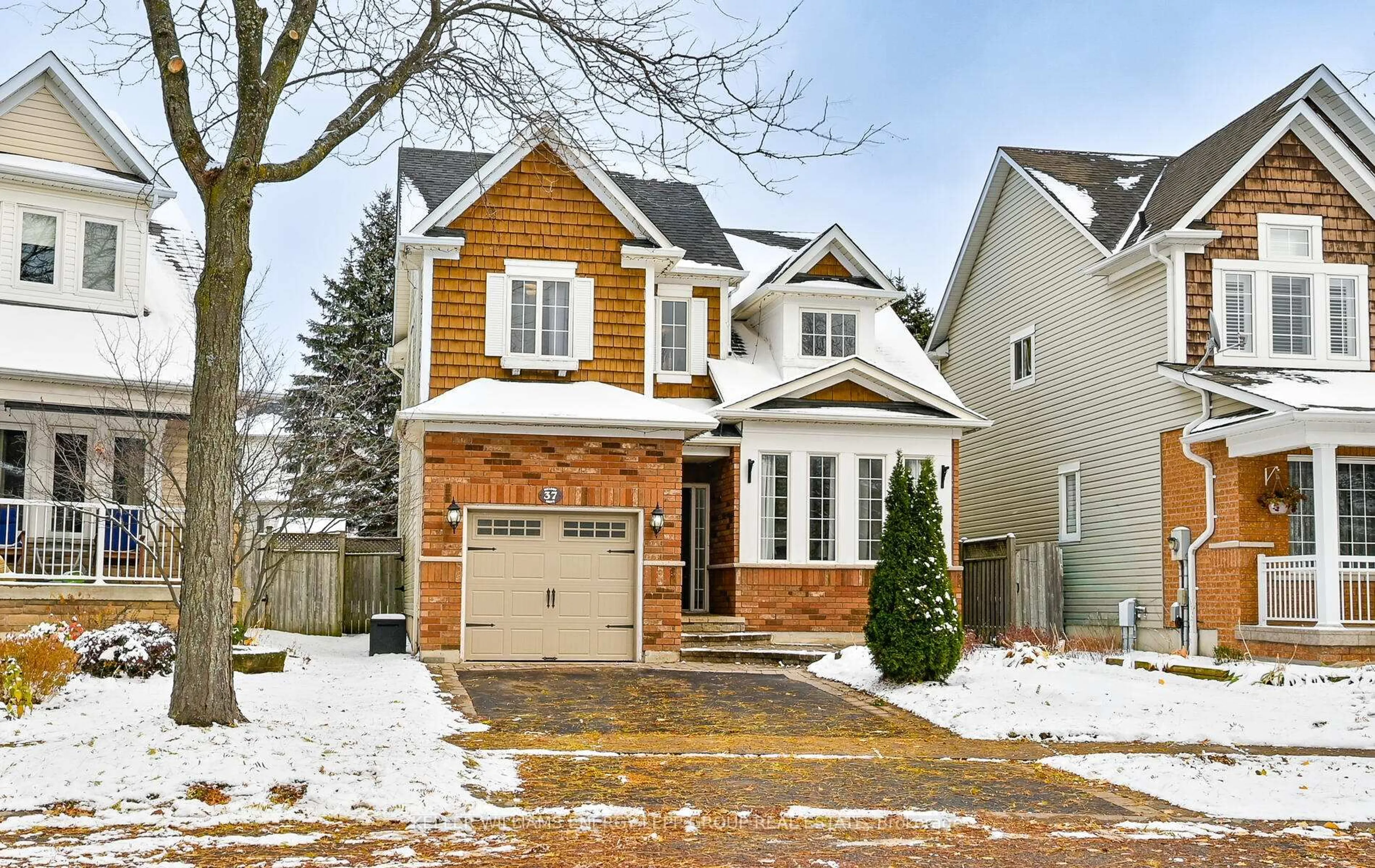 Home with brick exterior material, street for 37 Melody Dr, Whitby Ontario L1M 1K6