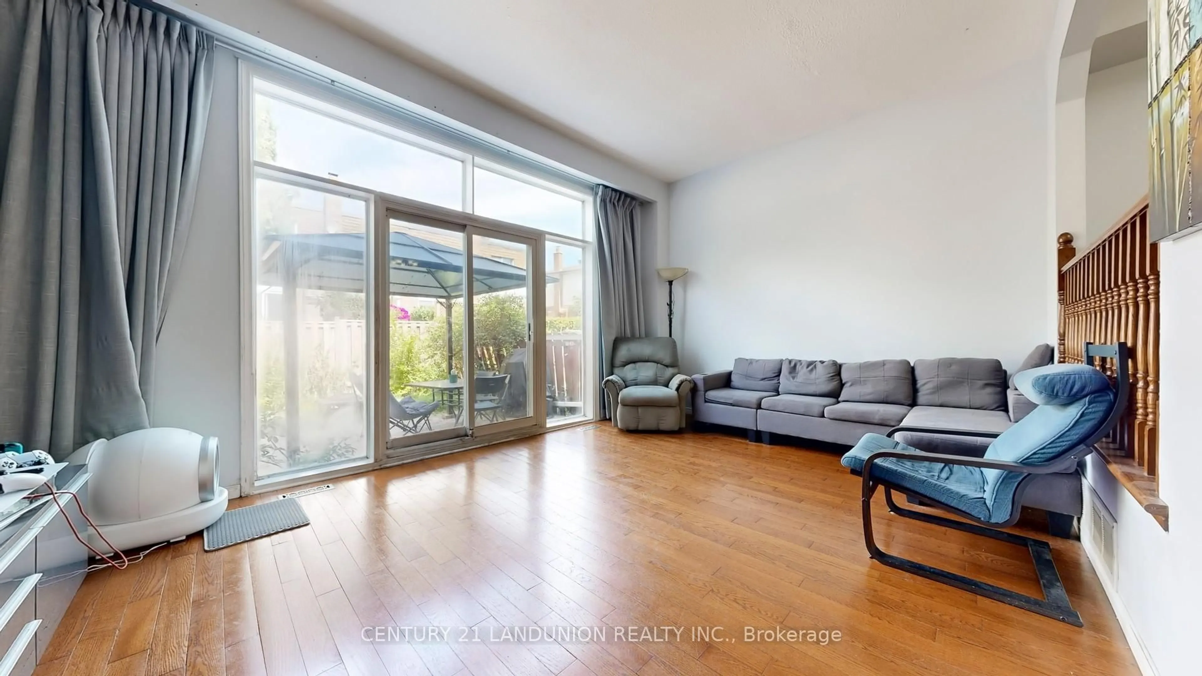 Living room with furniture, wood/laminate floor for 132 Silver Springs Blvd, Toronto Ontario M1V 1N1