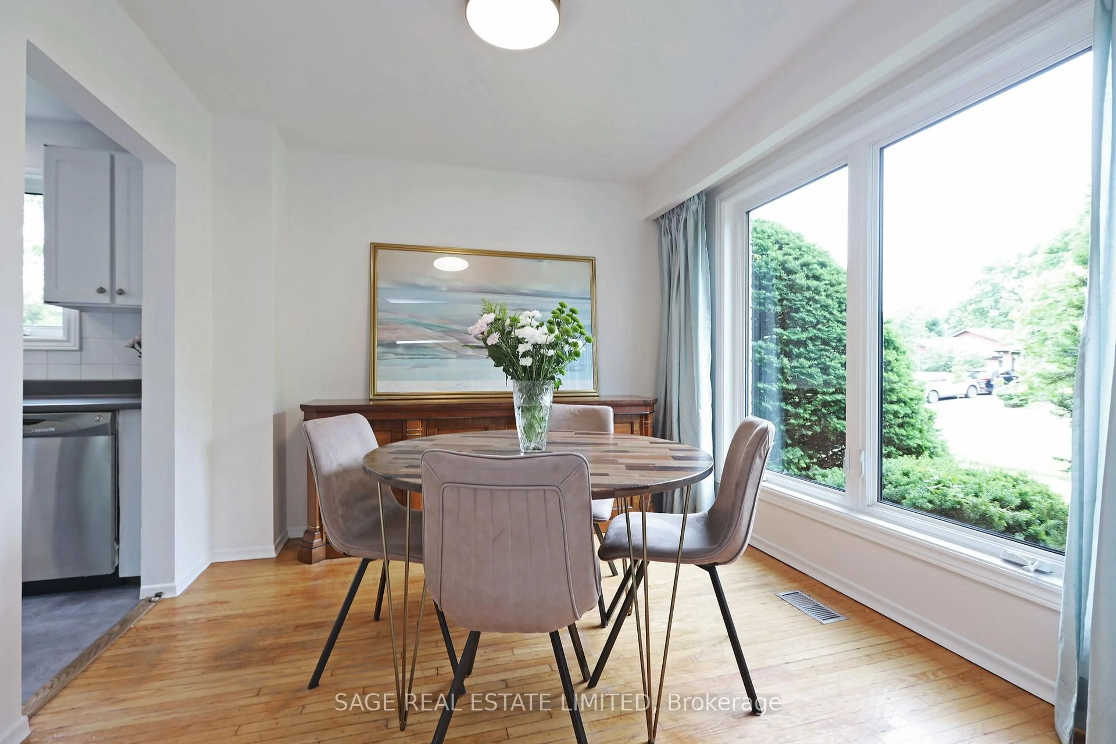 Dining room, wood/laminate floor for 51 Prince Philip Blvd, Toronto Ontario M1E 1J5