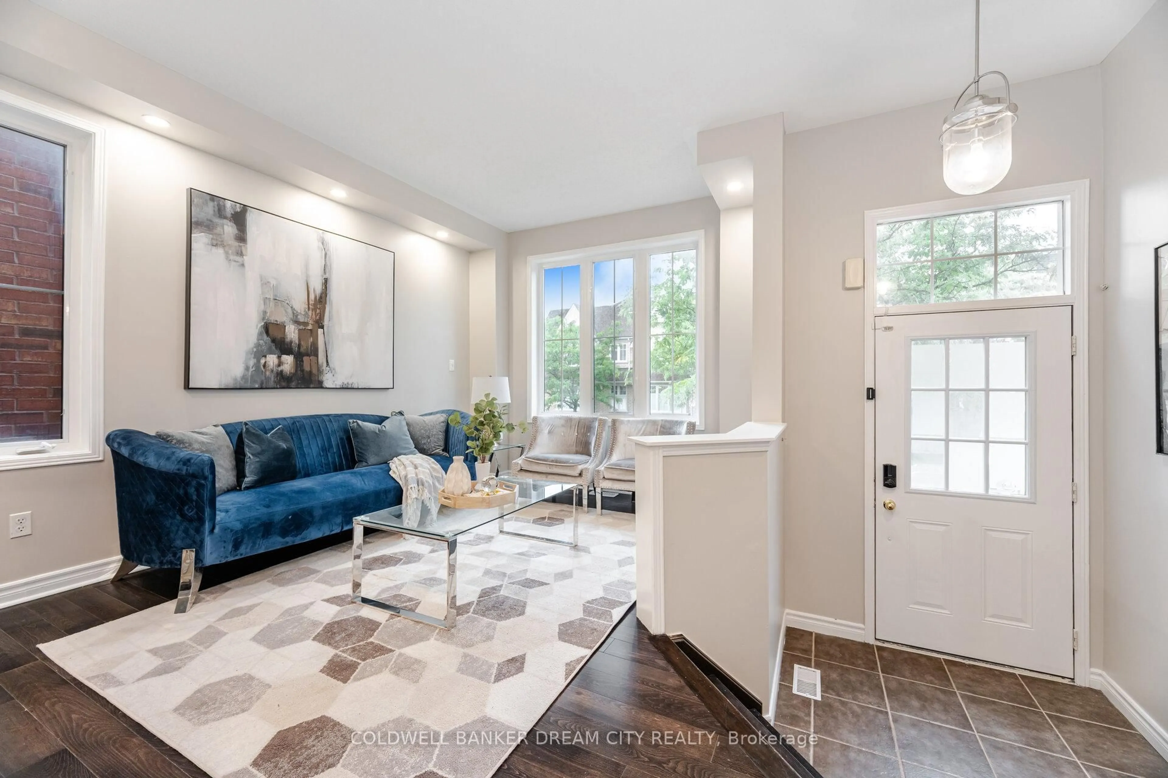 Living room with furniture, ceramic/tile floor for 70 Brandwood Sq, Ajax Ontario L1Z 2B9