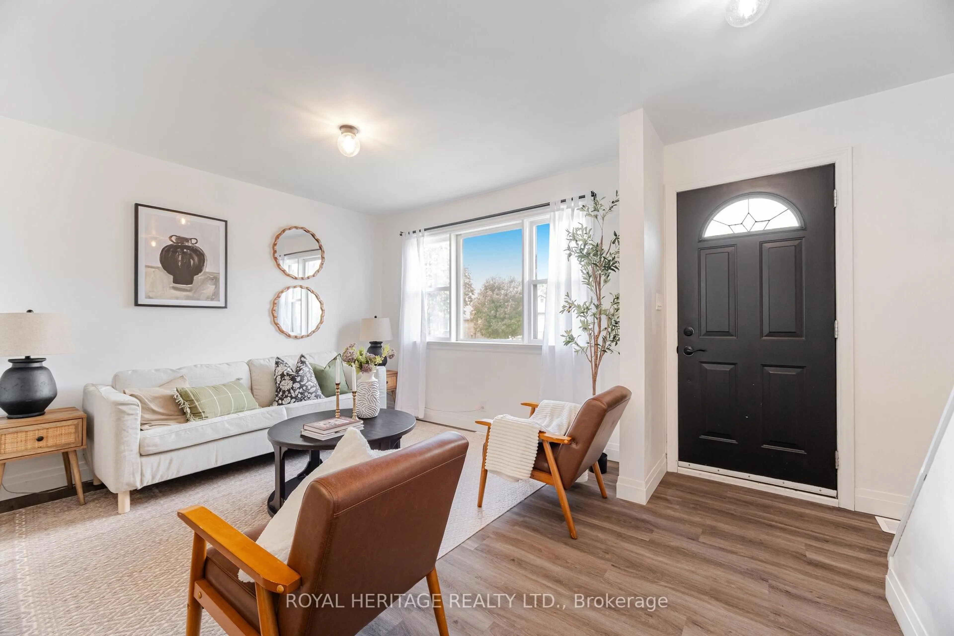 Living room with furniture, wood/laminate floor for 241 Marquette Ave, Oshawa Ontario L1J 1W3