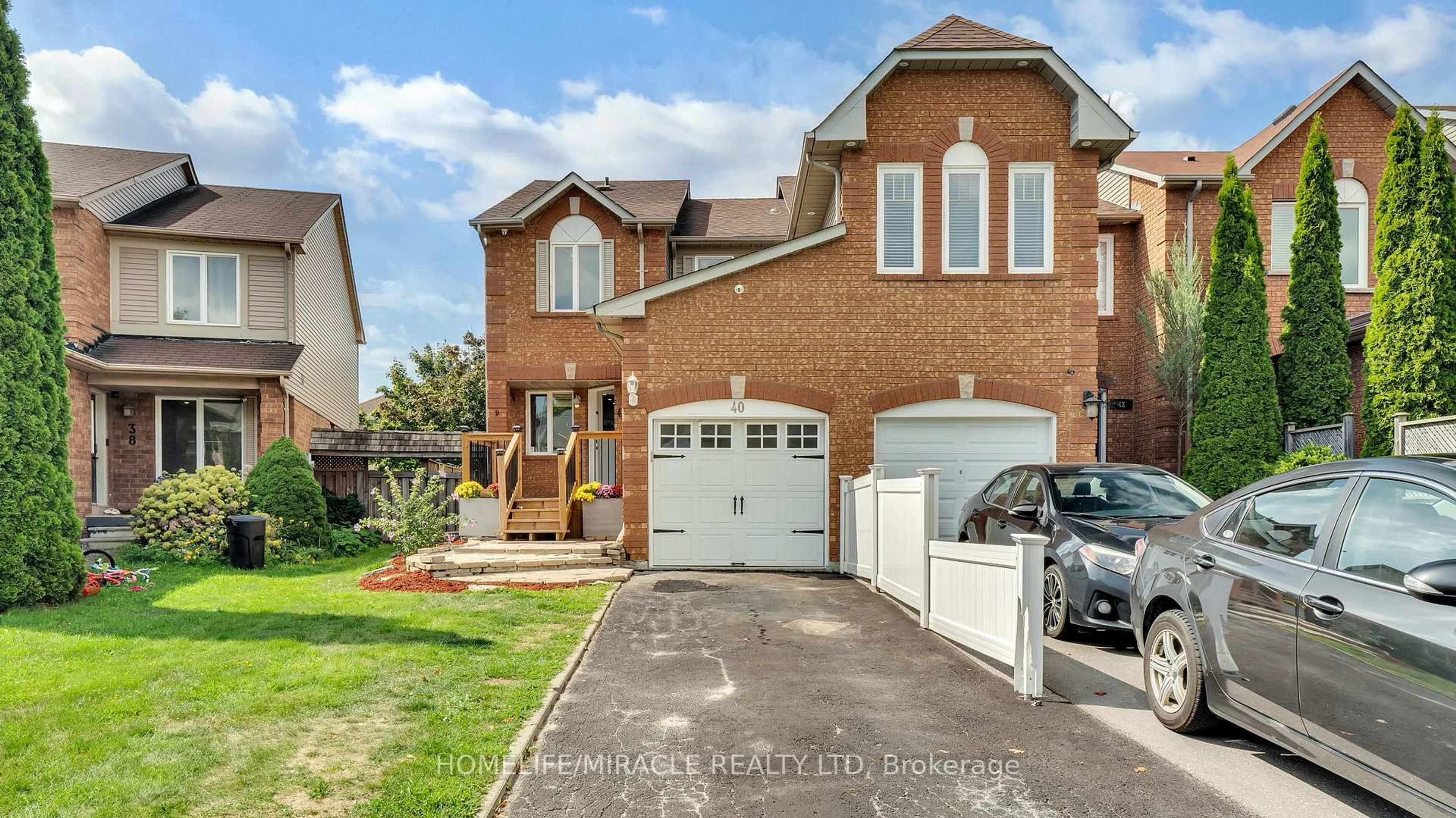 Home with brick exterior material, street for 40 Landerville Lane, Clarington Ontario L1C 4W8