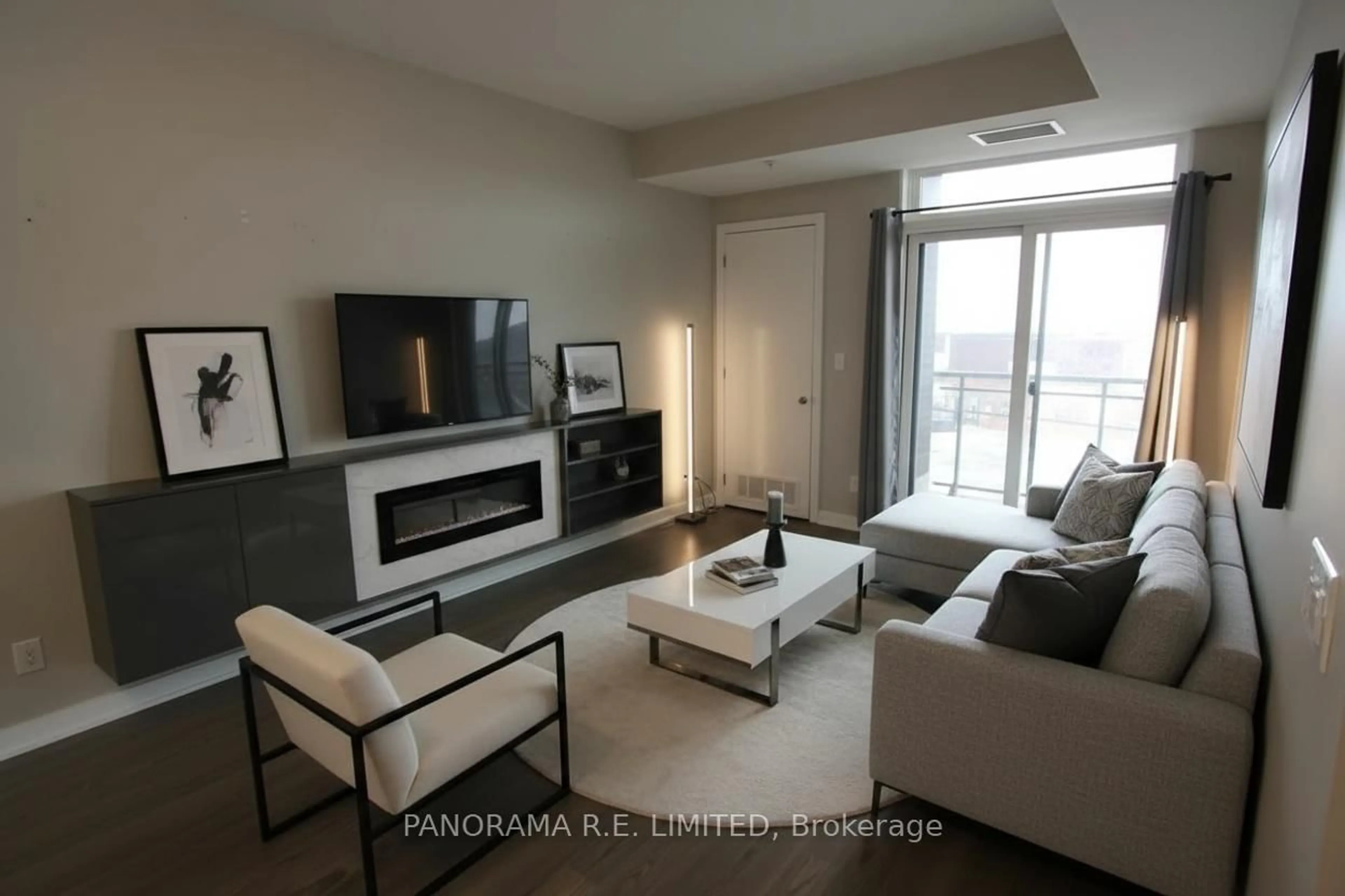 Living room with furniture, unknown for 3560 St Clair Ave #318, Toronto Ontario M1K 2A7