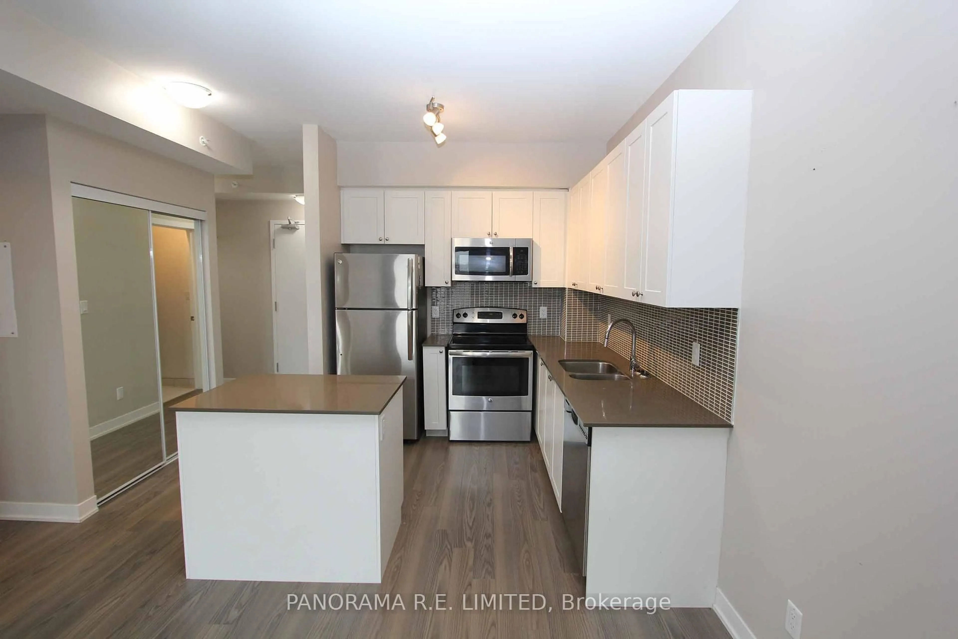 Standard kitchen, wood/laminate floor for 3560 St Clair Ave #318, Toronto Ontario M1K 2A7