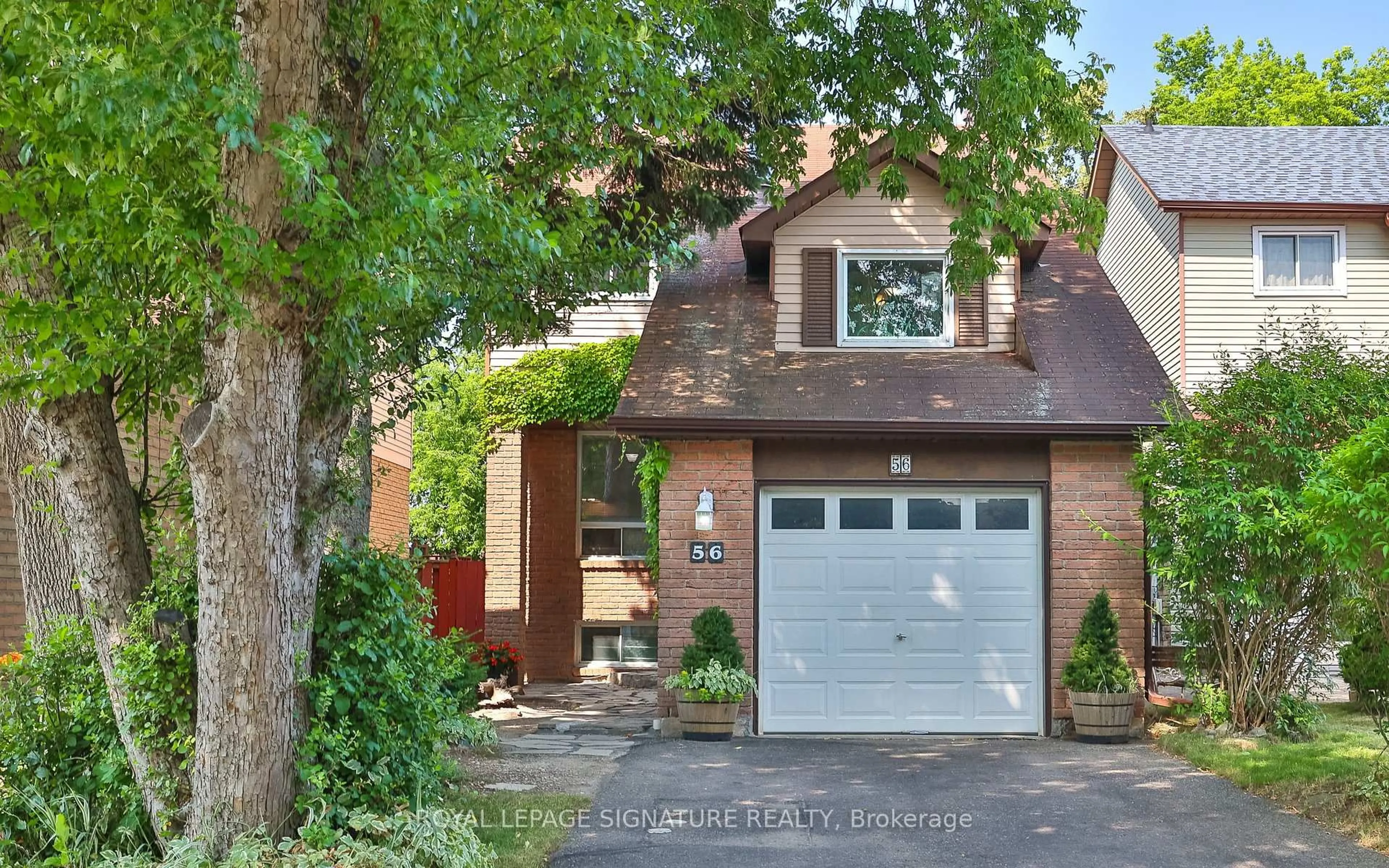 Home with brick exterior material, street for 56 Muirlands Dr, Toronto Ontario M1V 2B4