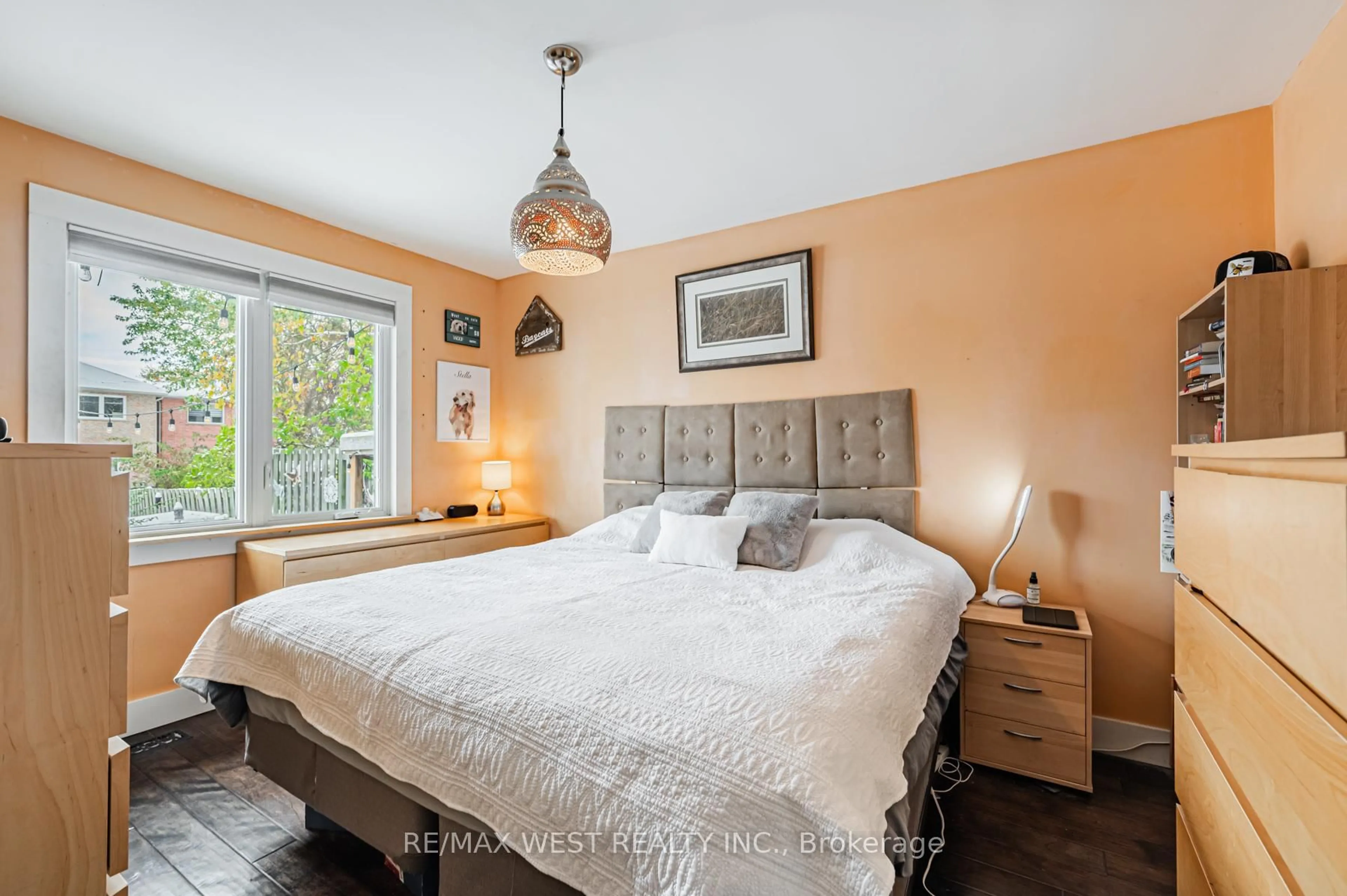 Bedroom with bed, wood/laminate floor for 75 Homestead Rd, Toronto Ontario M1E 3S1