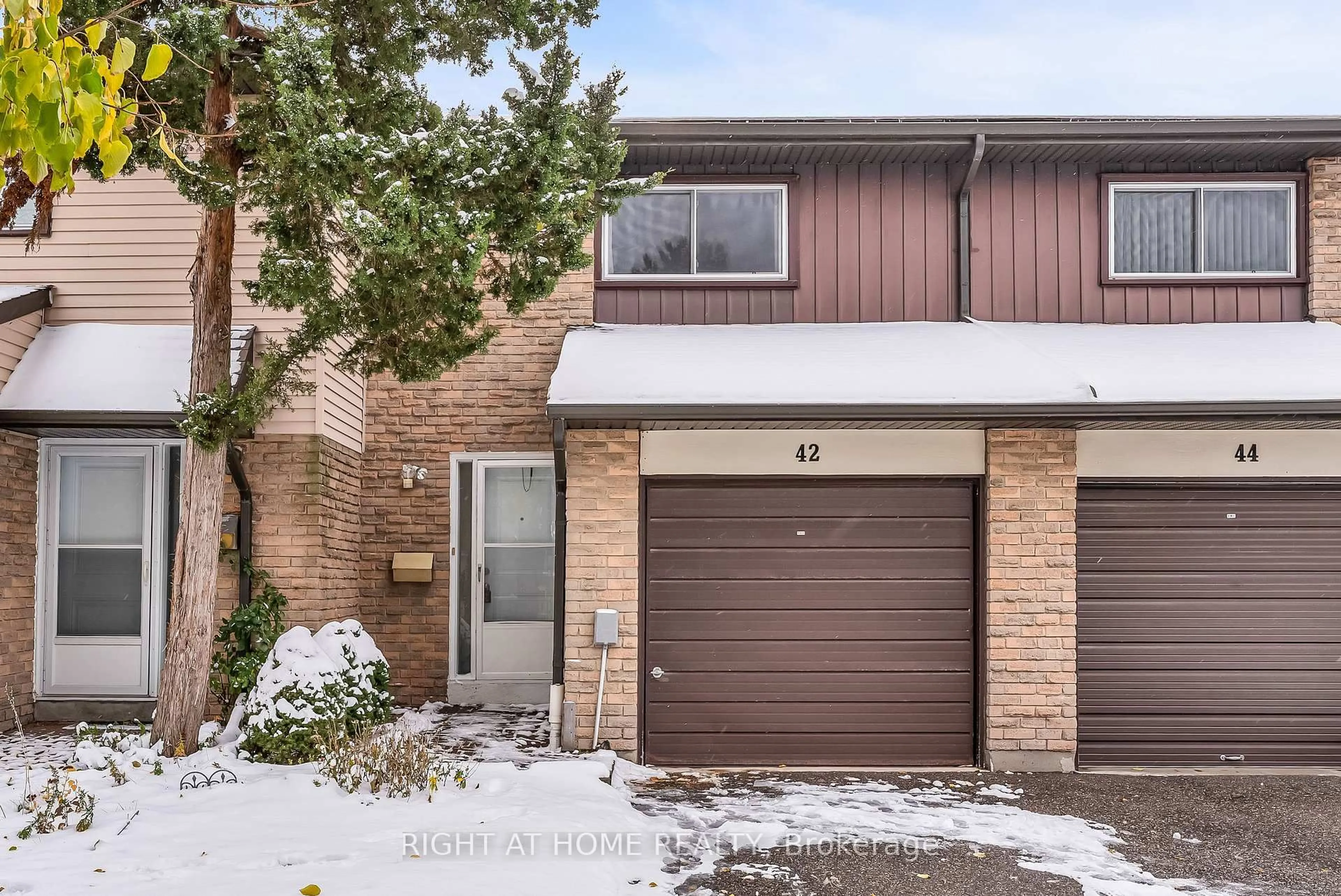 Home with brick exterior material, street for 1121 Sandhurst Circ #42, Toronto Ontario M1V 1V4