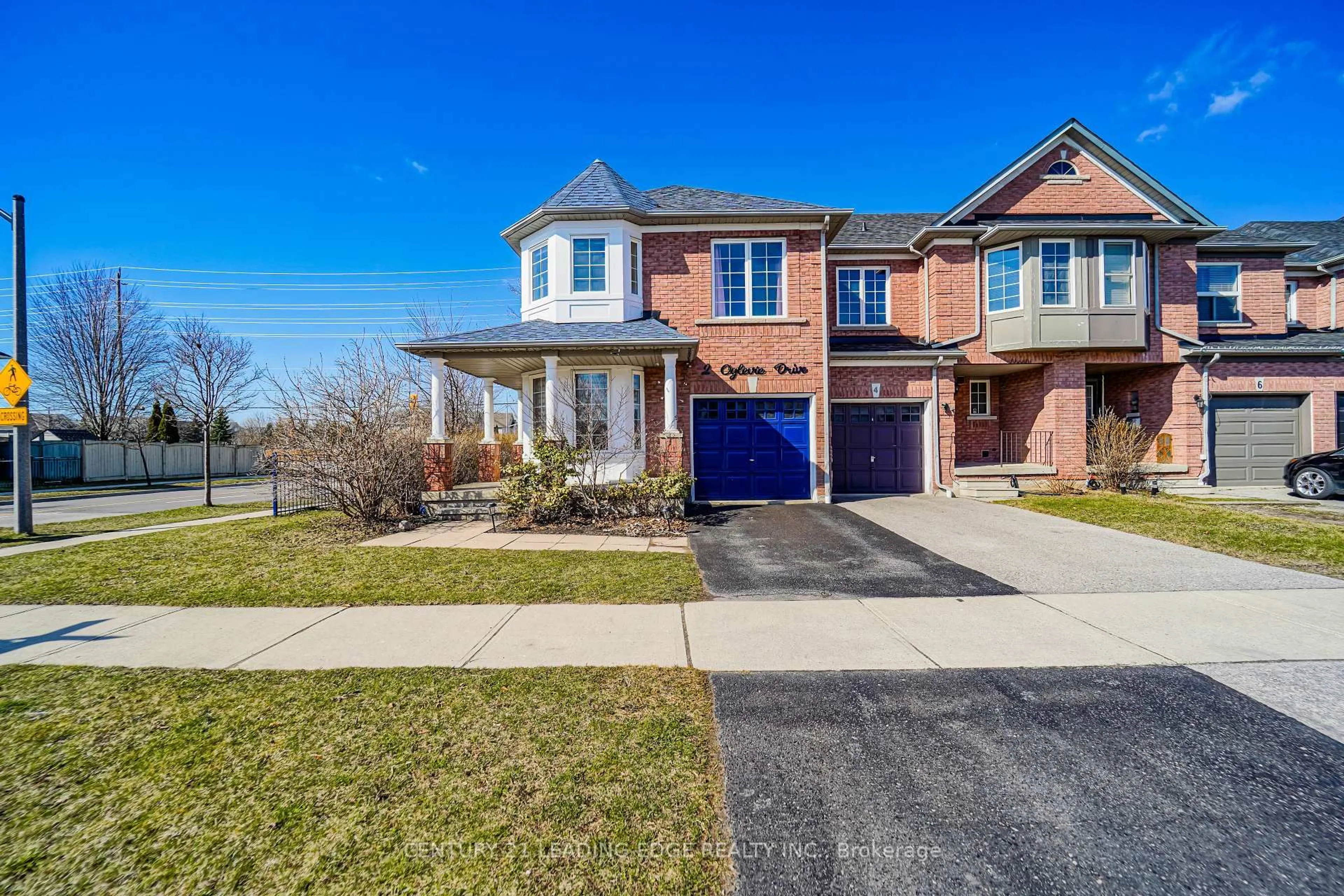 Home with brick exterior material, street for 2 Oglevie Dr, Whitby Ontario L1R 2Y4