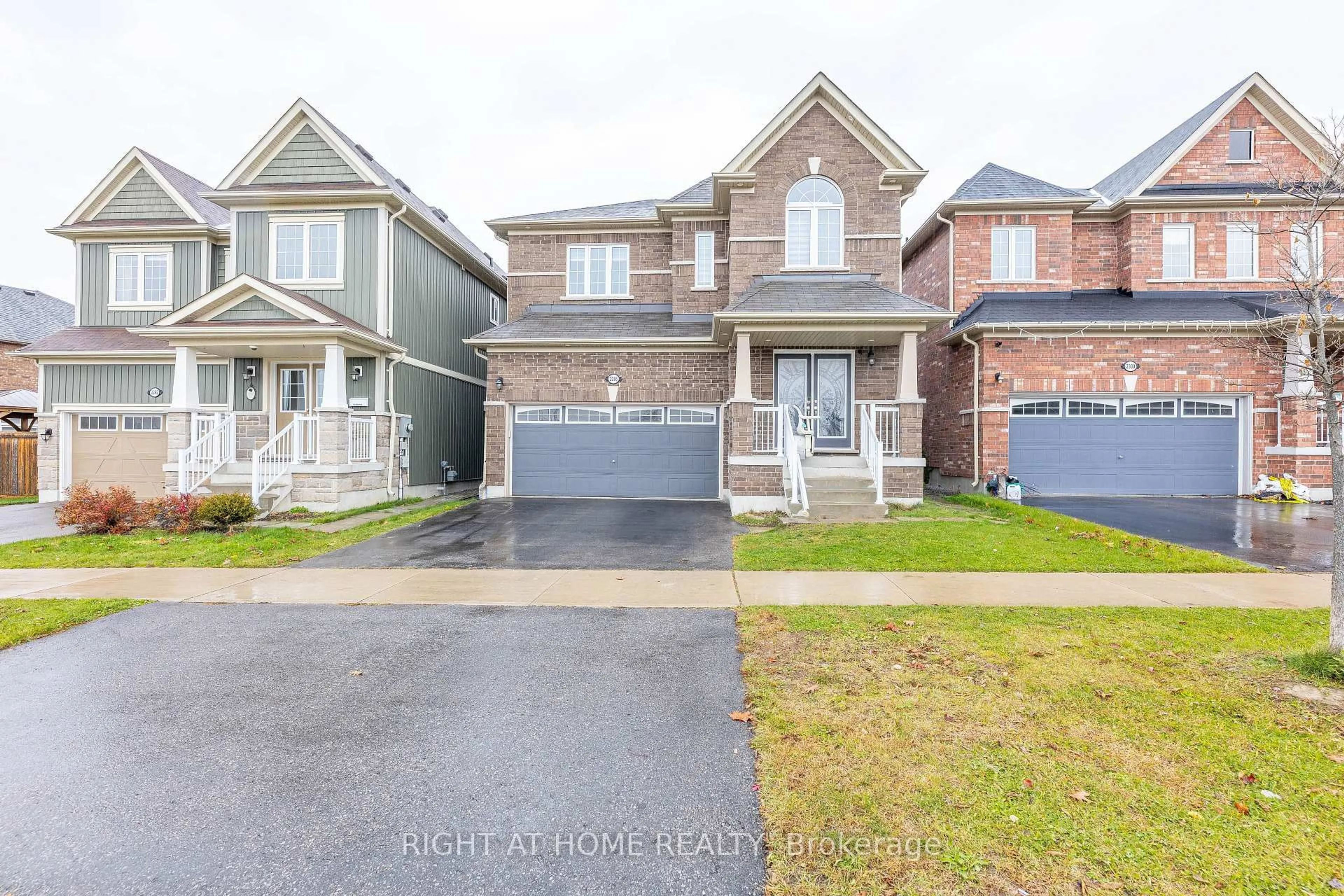 Home with brick exterior material, street for 2296 Secreto Dr, Oshawa Ontario L1L 0L3