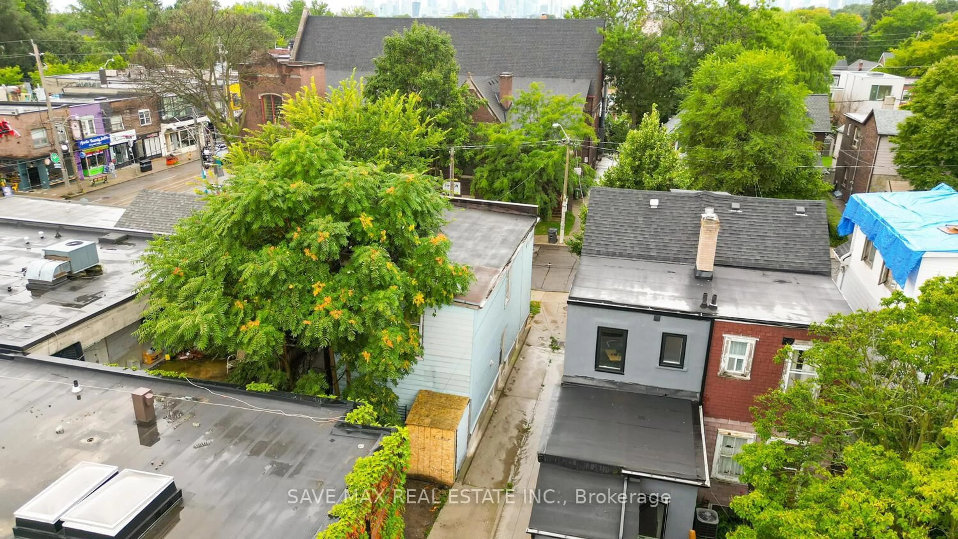 A pic from outside/outdoor area/front of a property/back of a property/a pic from drone, city buildings view from balcony for 283 Rhodes Ave, Toronto Ontario M4L 3A4