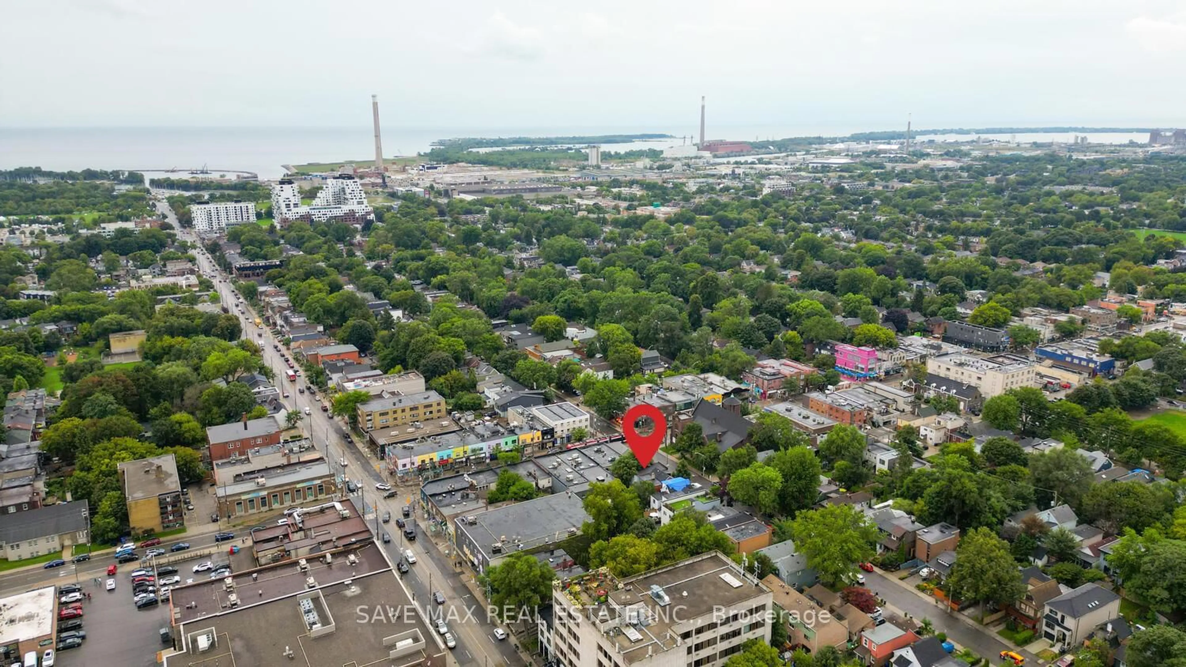 A pic from outside/outdoor area/front of a property/back of a property/a pic from drone, city buildings view from balcony for 283 Rhodes Ave, Toronto Ontario M4L 3A4