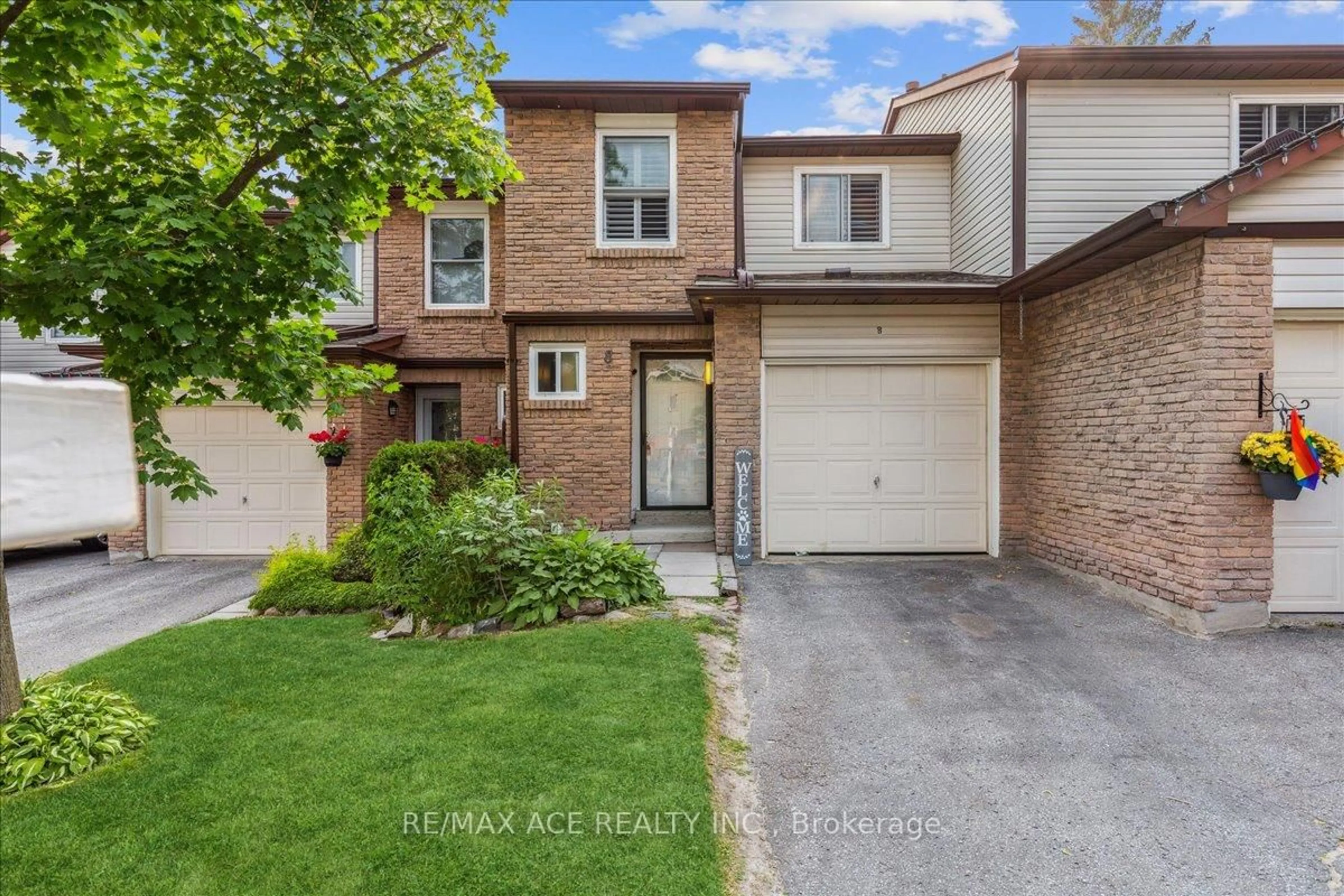 Home with brick exterior material, street for 1330 Trowbridge Dr #8, Oshawa Ontario L1G 7R7