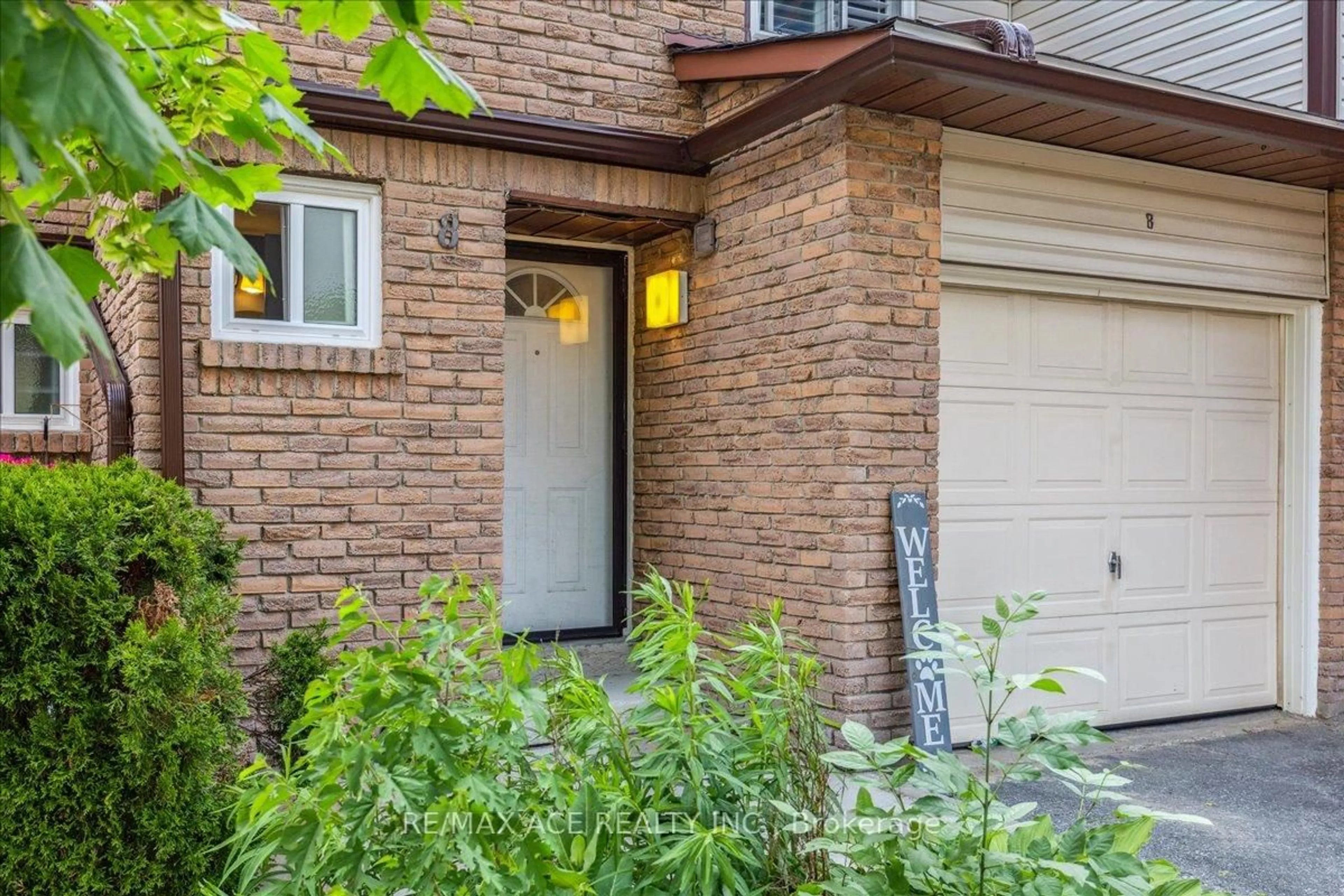 Home with brick exterior material, street for 1330 Trowbridge Dr #8, Oshawa Ontario L1G 7R7