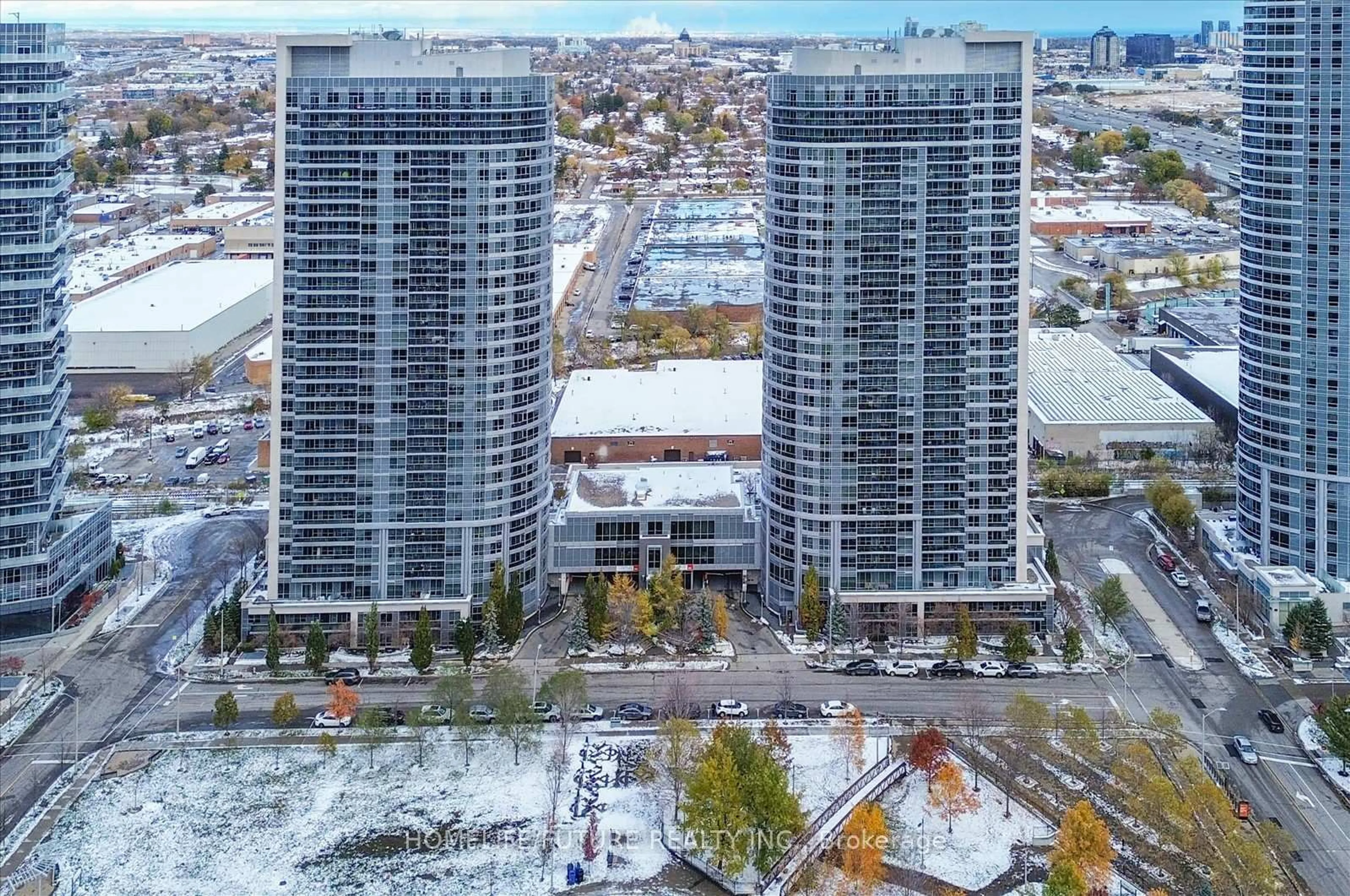 A pic from outside/outdoor area/front of a property/back of a property/a pic from drone, city buildings view from balcony for 181 Village Green Sq #216, Toronto Ontario M1S 0K6