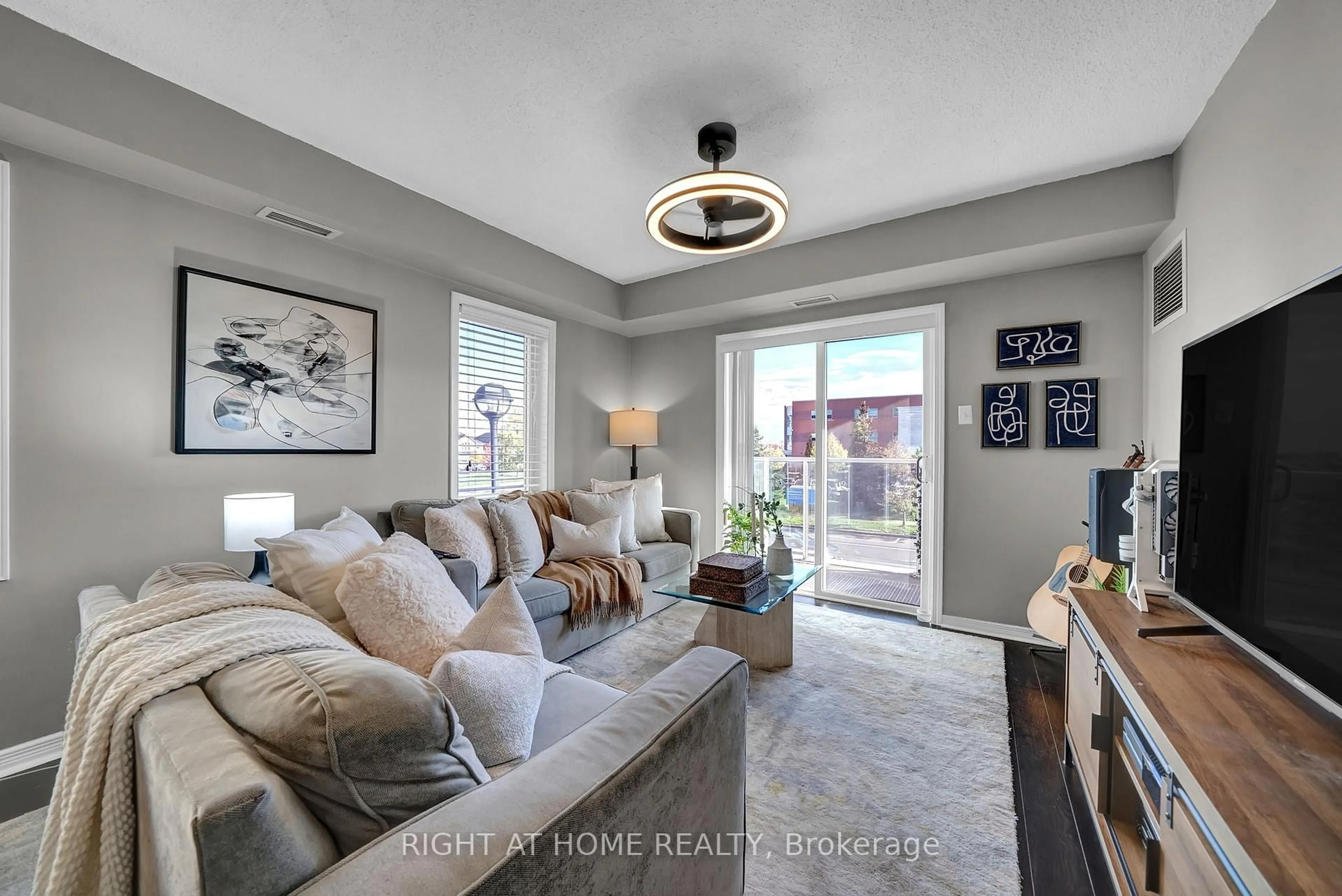 Living room with furniture, unknown for 132 Aspen Springs Dr #205, Clarington Ontario L1C 0H1