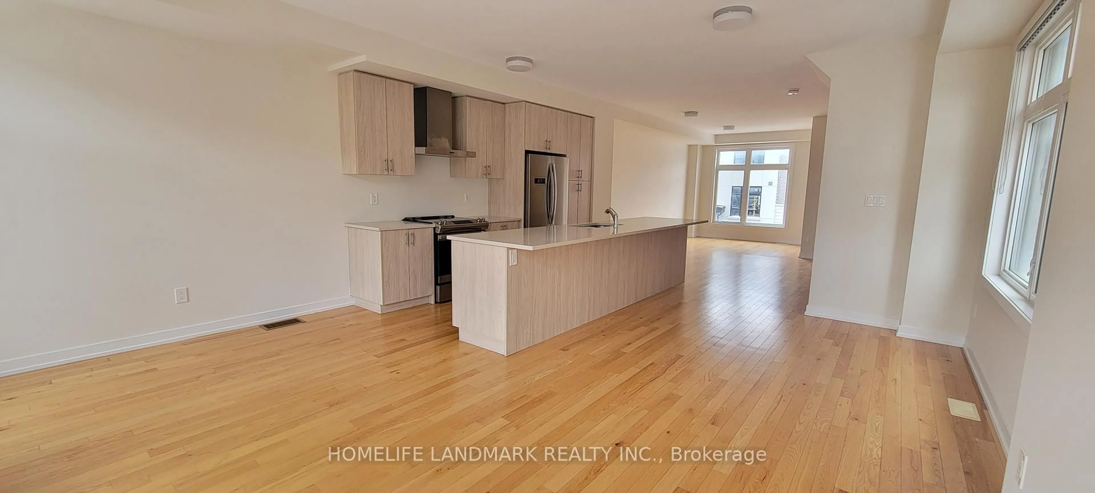 Open concept kitchen, wood/laminate floor for 2514 Castlegate Crossing, Pickering Ontario M1X 0H6