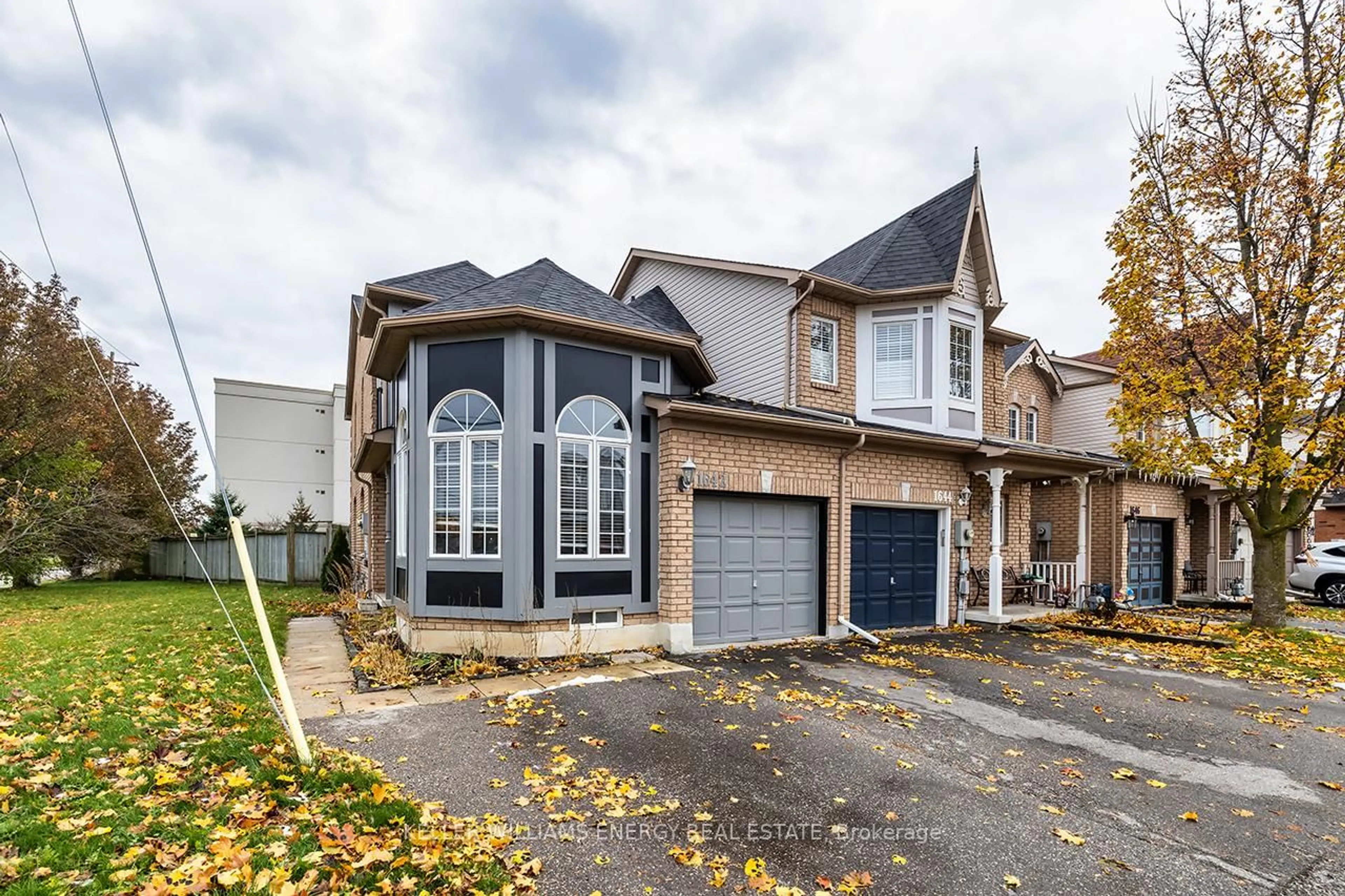 Home with brick exterior material, street for 1642 Woodgate Tr, Oshawa Ontario L1G 8B5