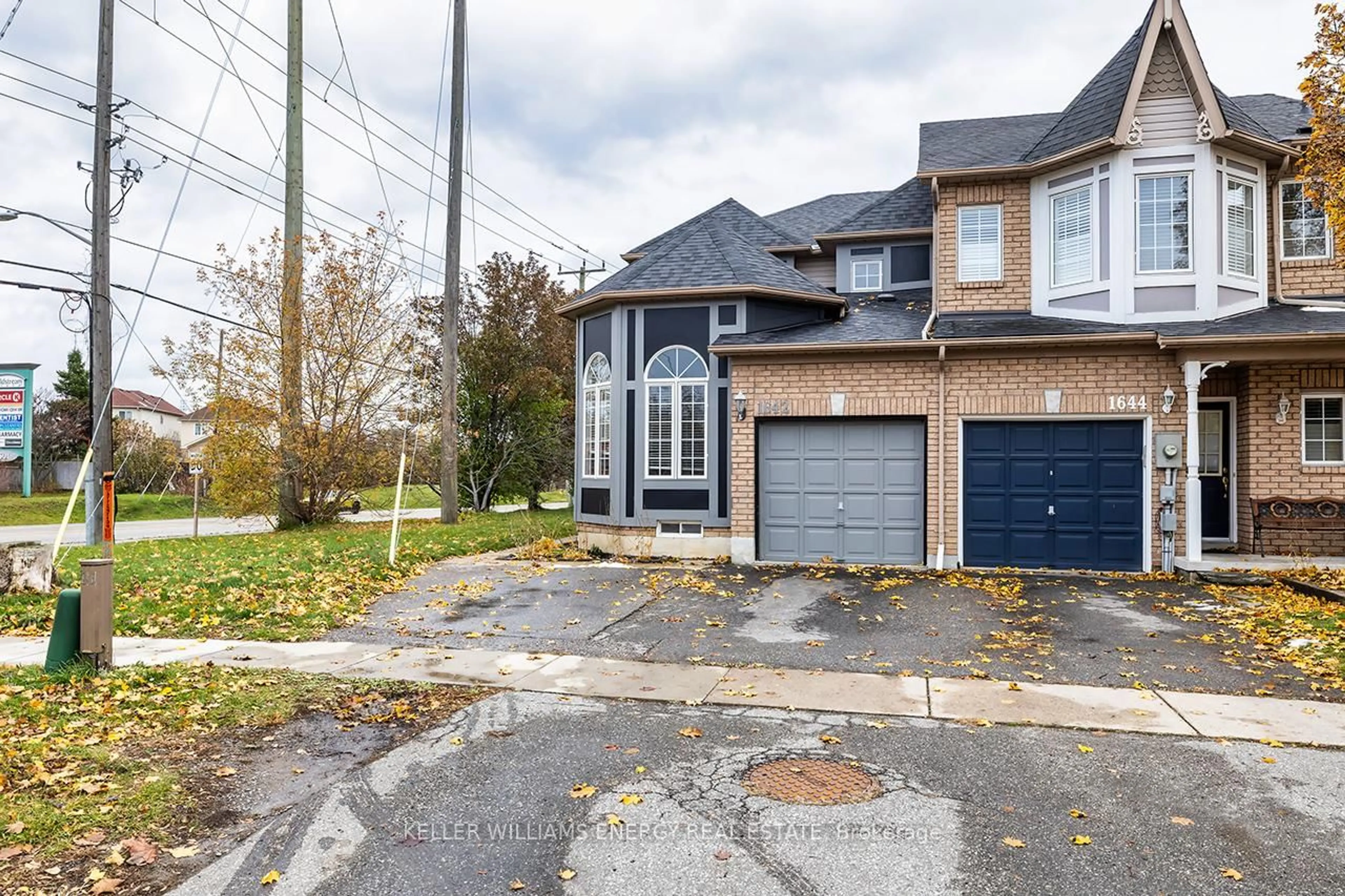 Home with brick exterior material, street for 1642 Woodgate Tr, Oshawa Ontario L1G 8B5