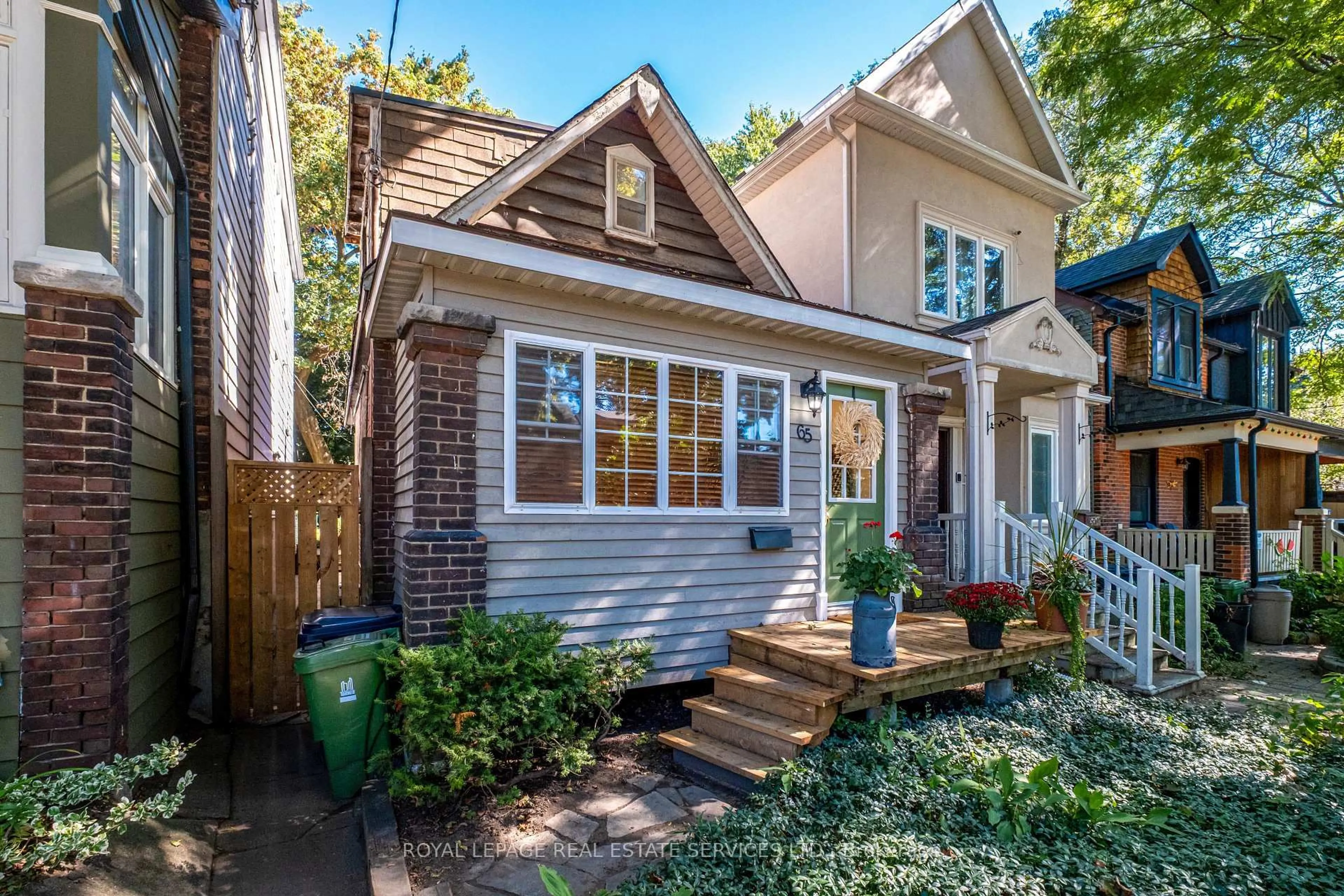 Home with brick exterior material, street for 65 Drayton Ave, Toronto Ontario M4C 3L8