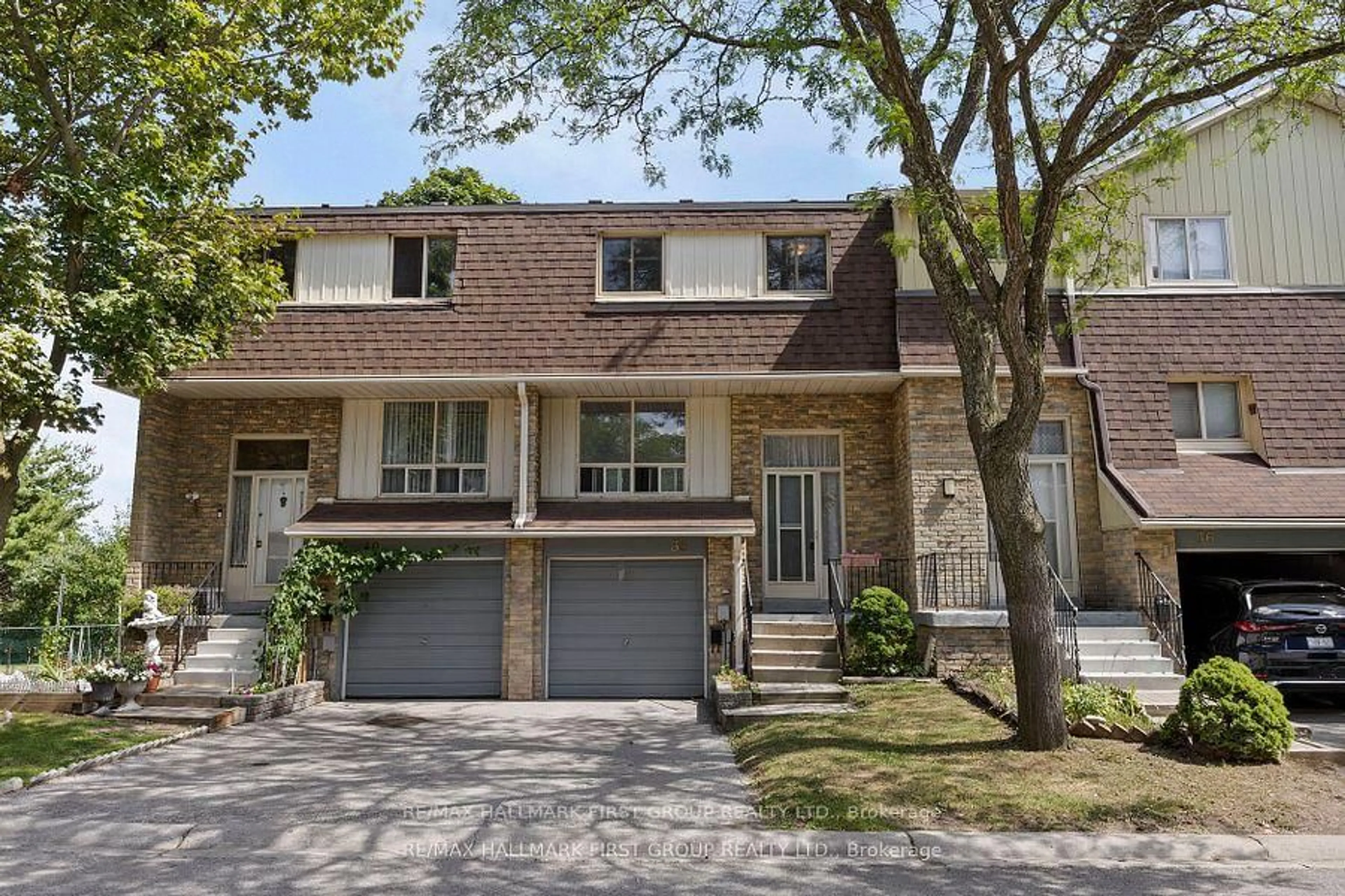 Home with brick exterior material, street for 371 Orton Park Rd #38, Toronto Ontario M1G 3V1