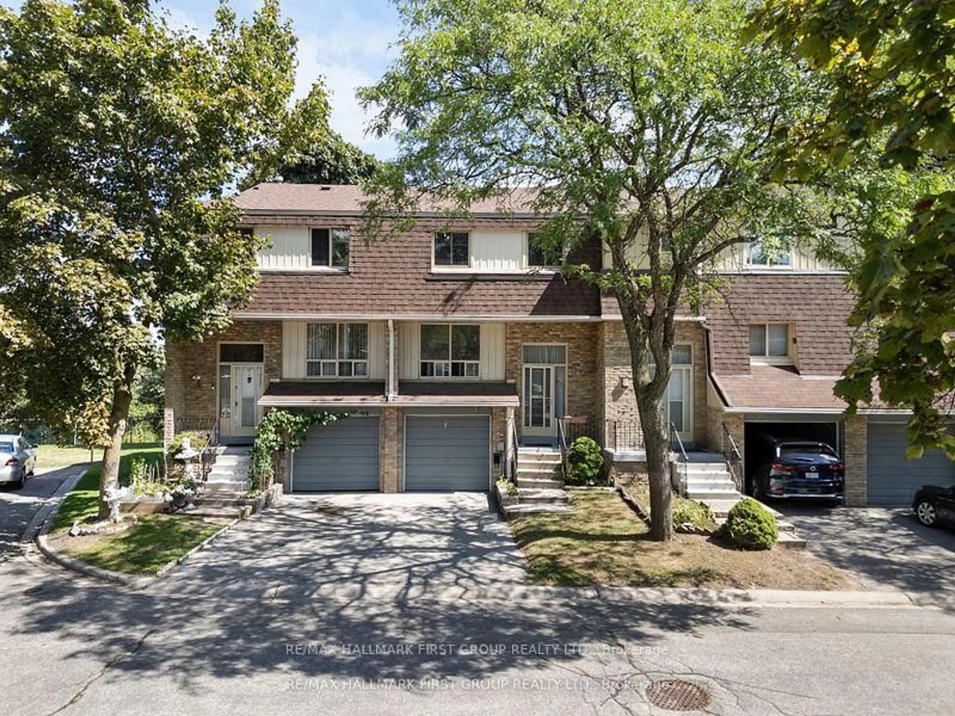 Home with brick exterior material, street for 371 Orton Park Rd #38, Toronto Ontario M1G 3V1