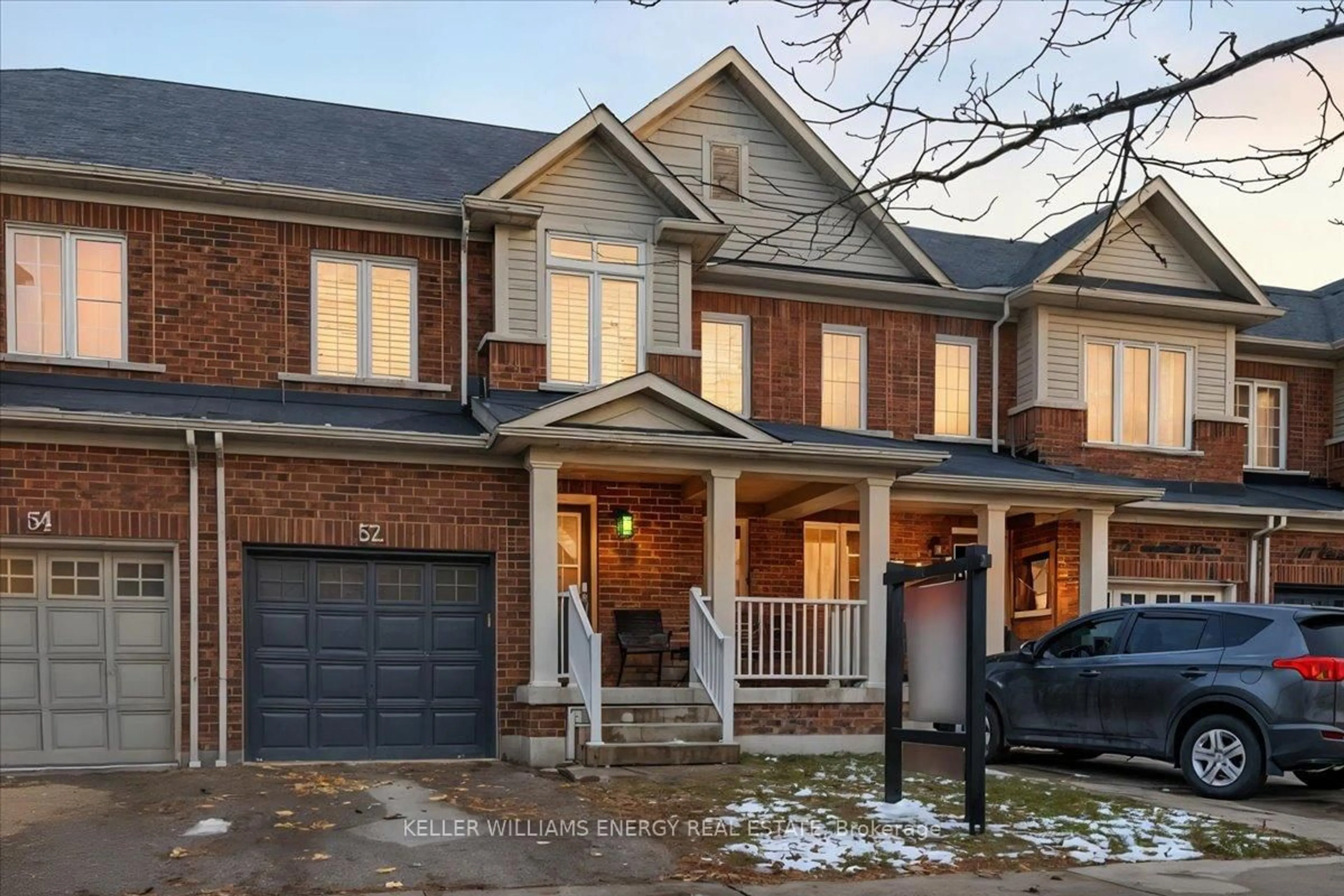 Home with brick exterior material, street for 52 Elliottglen Dr, Ajax Ontario L1Z 0H2
