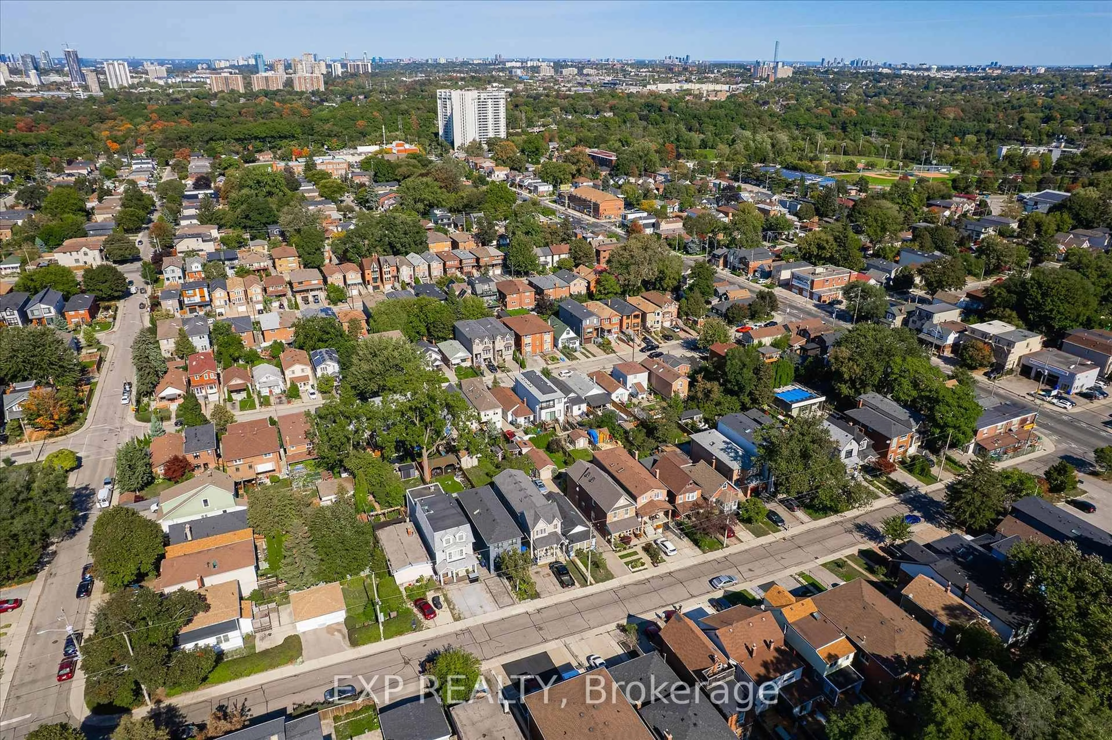A pic from outside/outdoor area/front of a property/back of a property/a pic from drone, street for 108 Barker Ave, Toronto Ontario M4C 2N9