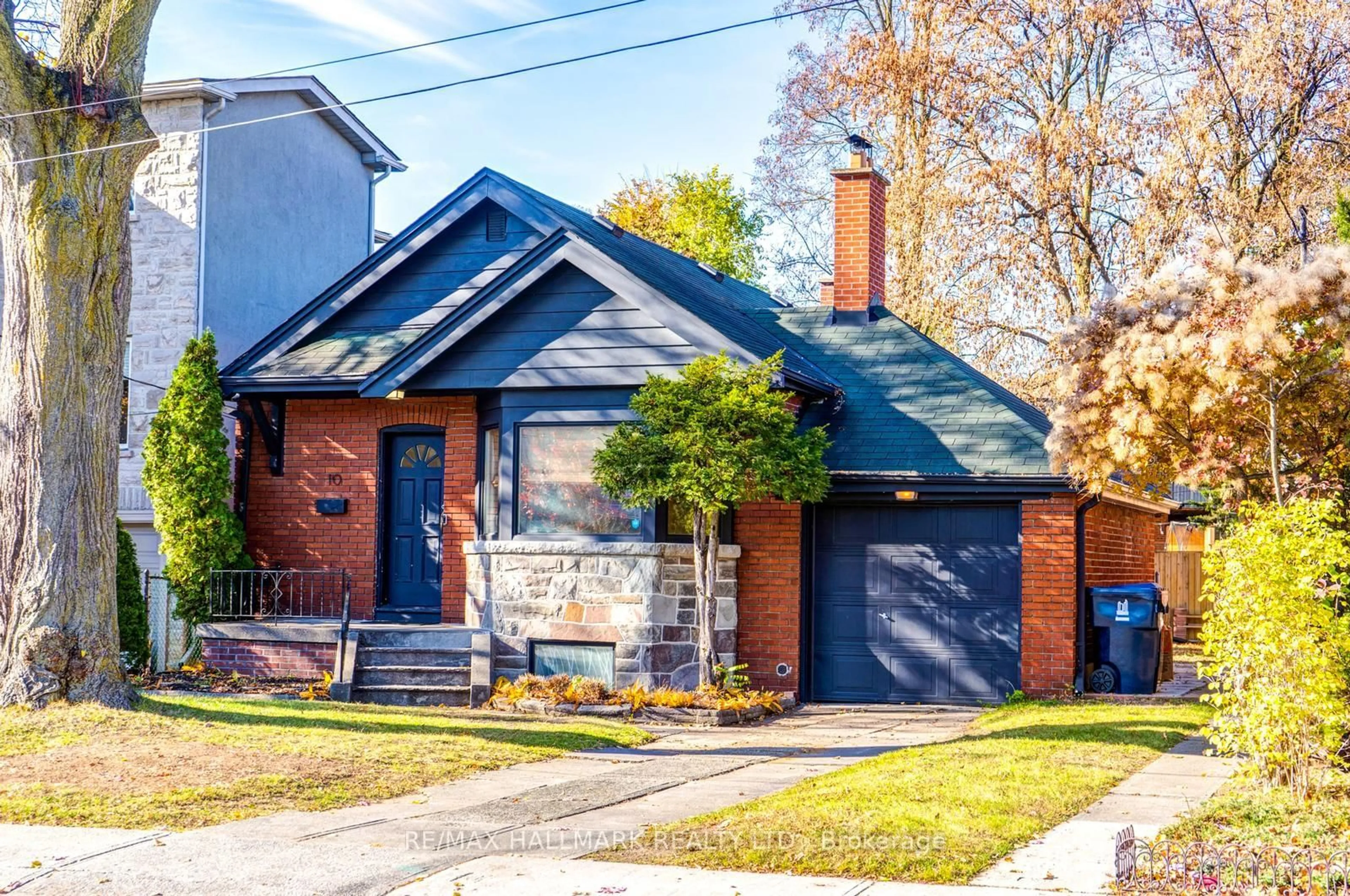 Home with brick exterior material, street for 10 Coxwell Blvd, Toronto Ontario M4C 3G7