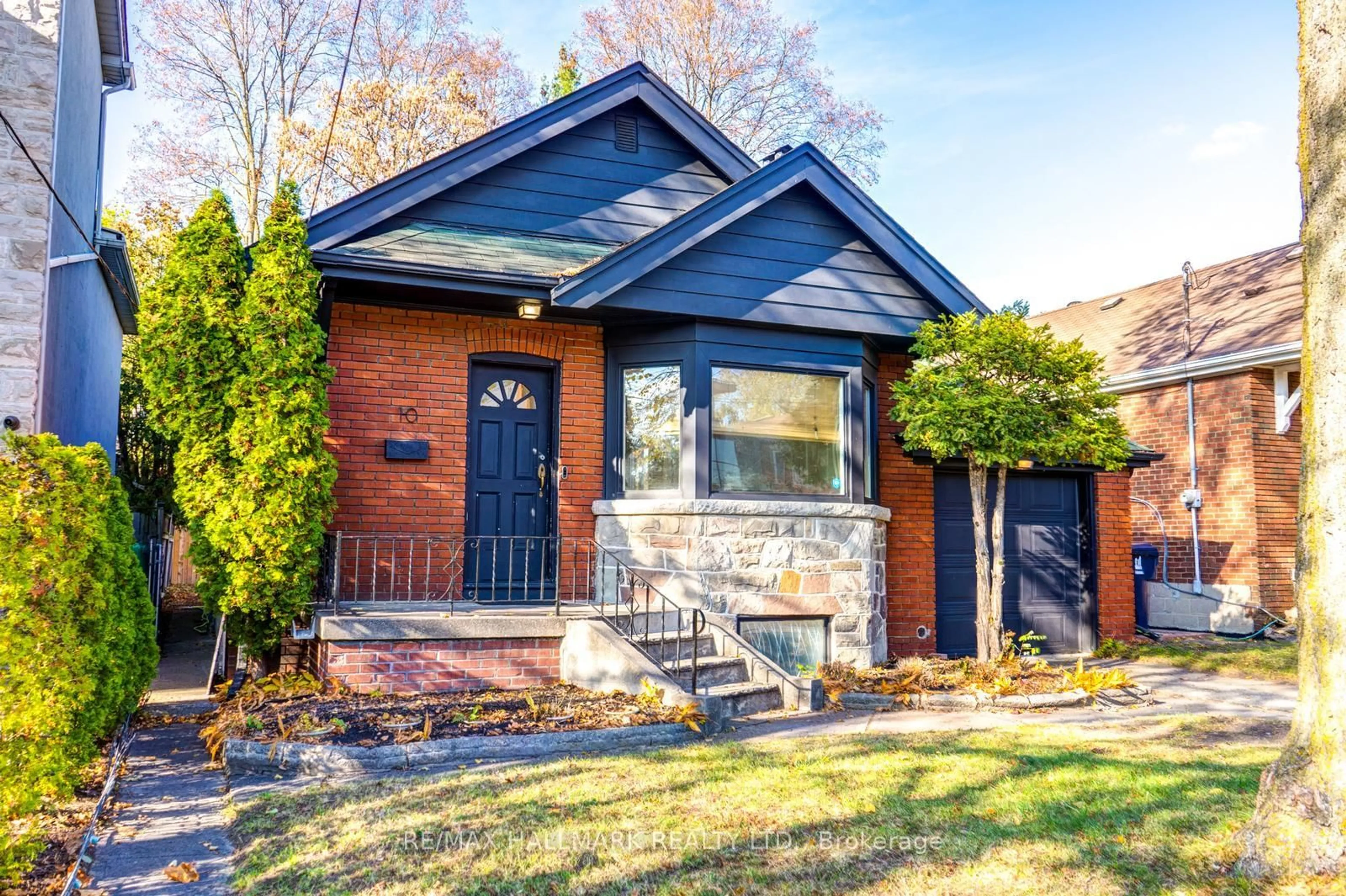 Home with brick exterior material, street for 10 Coxwell Blvd, Toronto Ontario M4C 3G7