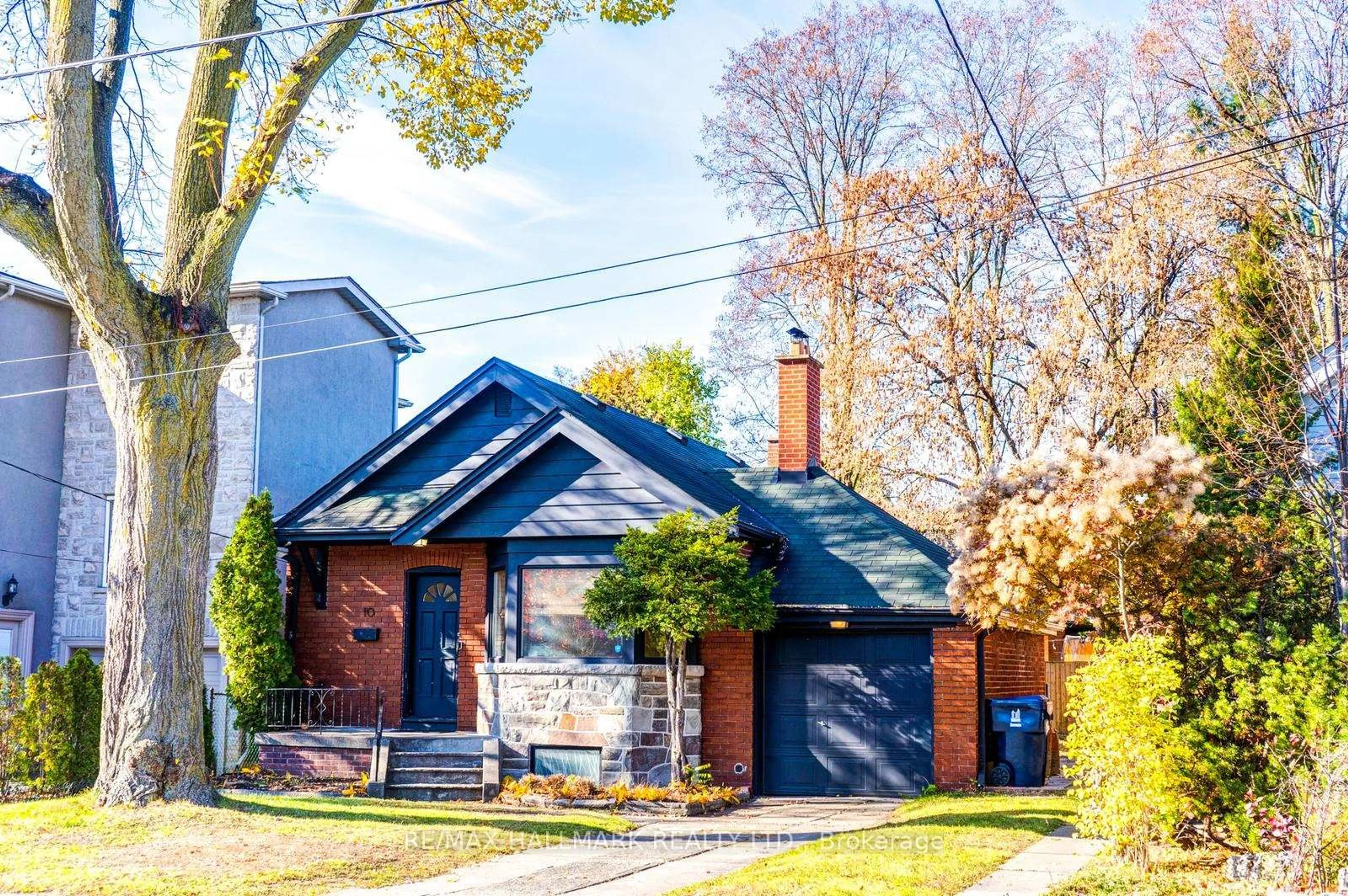 Home with brick exterior material, street for 10 Coxwell Blvd, Toronto Ontario M4C 3G7