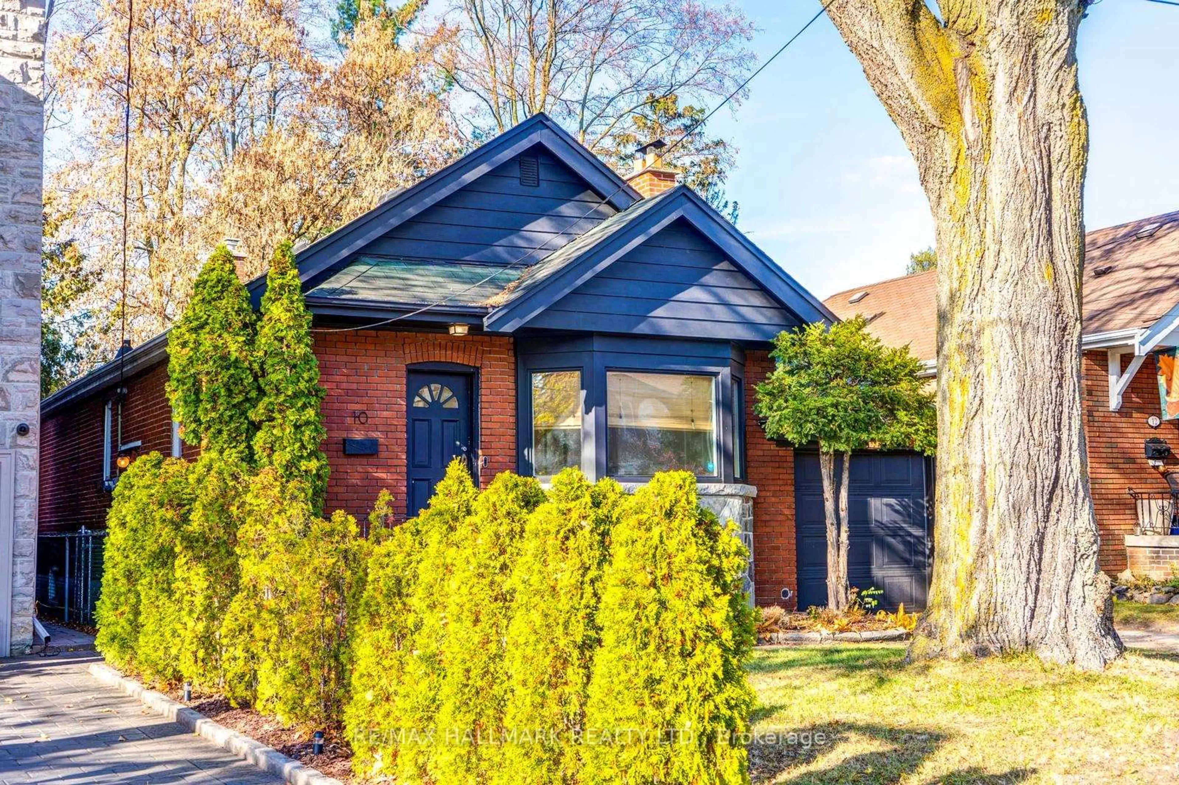 Home with brick exterior material, street for 10 Coxwell Blvd, Toronto Ontario M4C 3G7