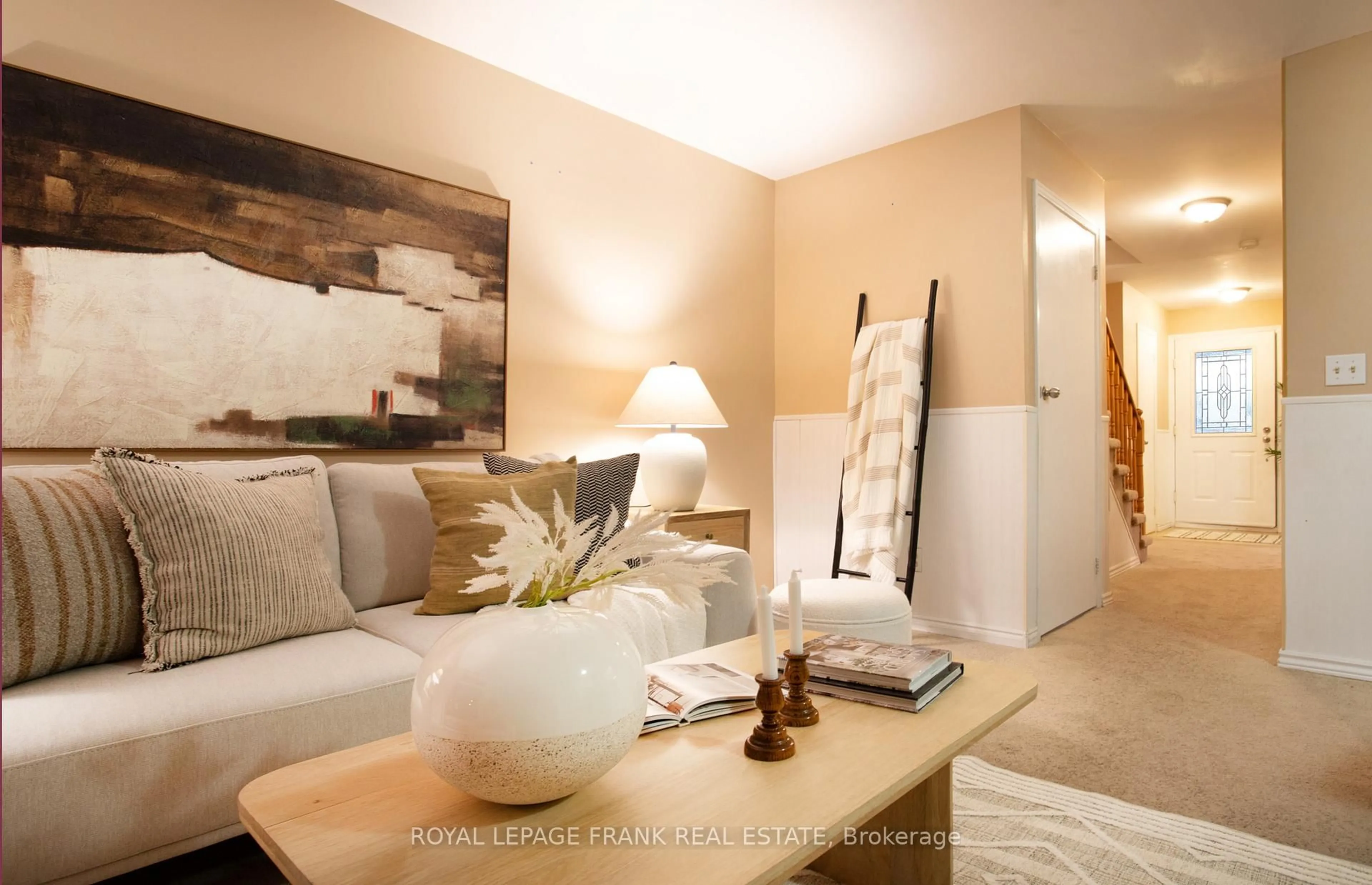 Living room with furniture, wood/laminate floor for 1466 O'Hara Crt, Oshawa Ontario L1J 8A4